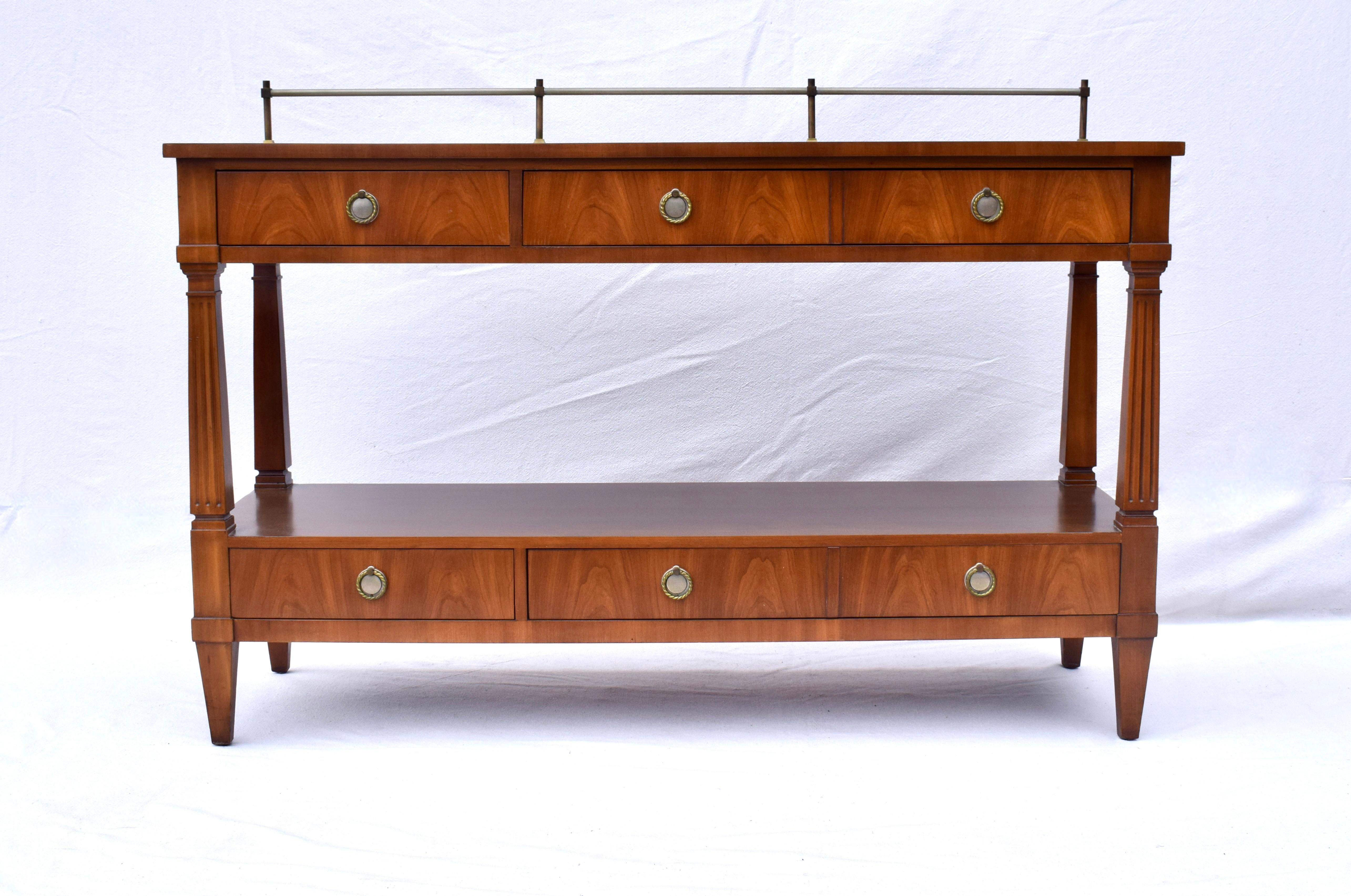John Widdicomb Directoire style two tier console server Buffet with marble top inserts, brass gallery and three storage drawers. Beautifully maintained in exceptional condition; ready for use. 14.5
