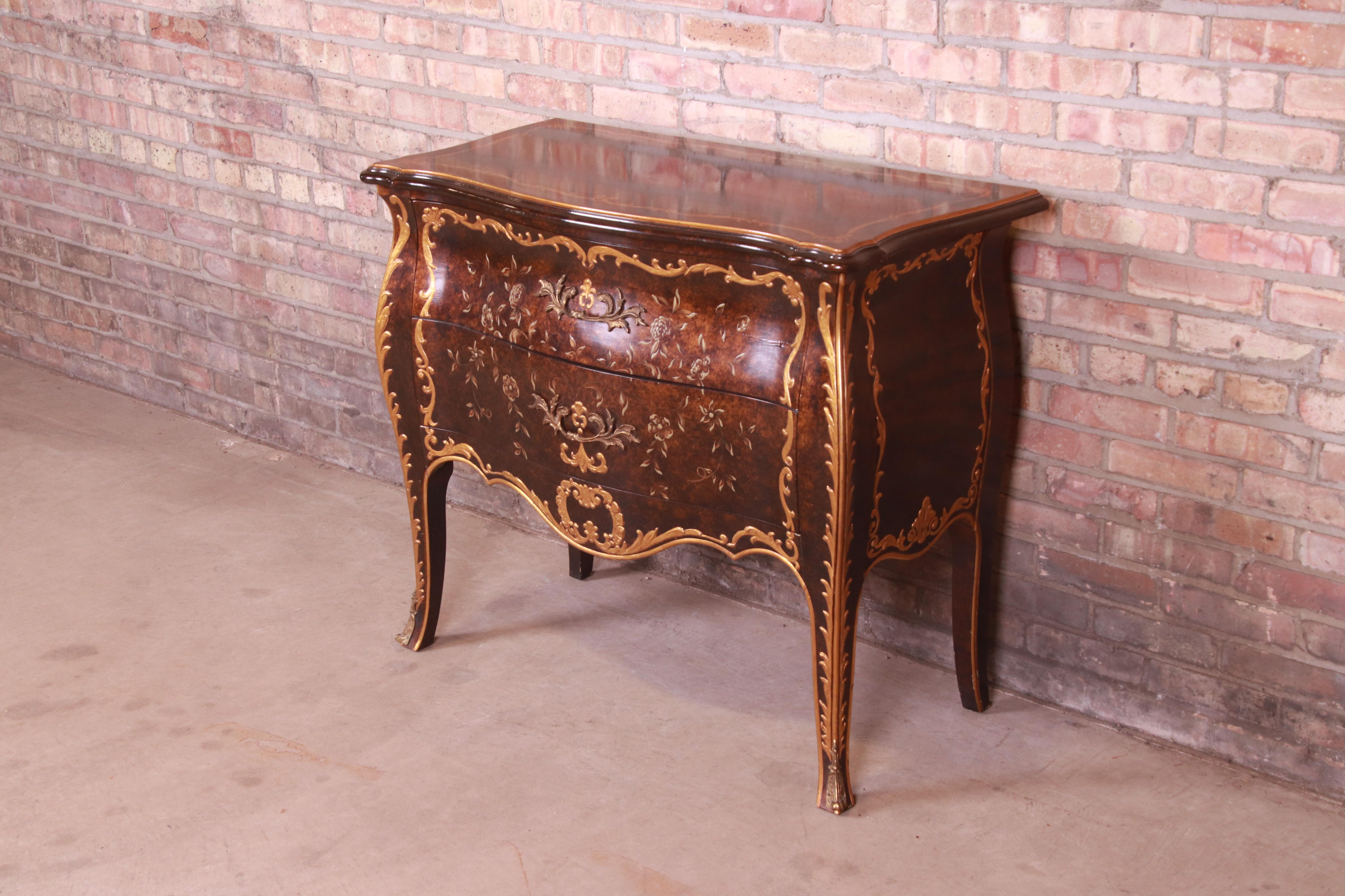 A gorgeous French Louis XV style commode or bombay chest

By John Widdicomb

USA, Late 20th century

Faux tortoise shell finish, with giltwood and paint decorated details, mounted ormolu, and original brass hardware.

Measures: 39.5
