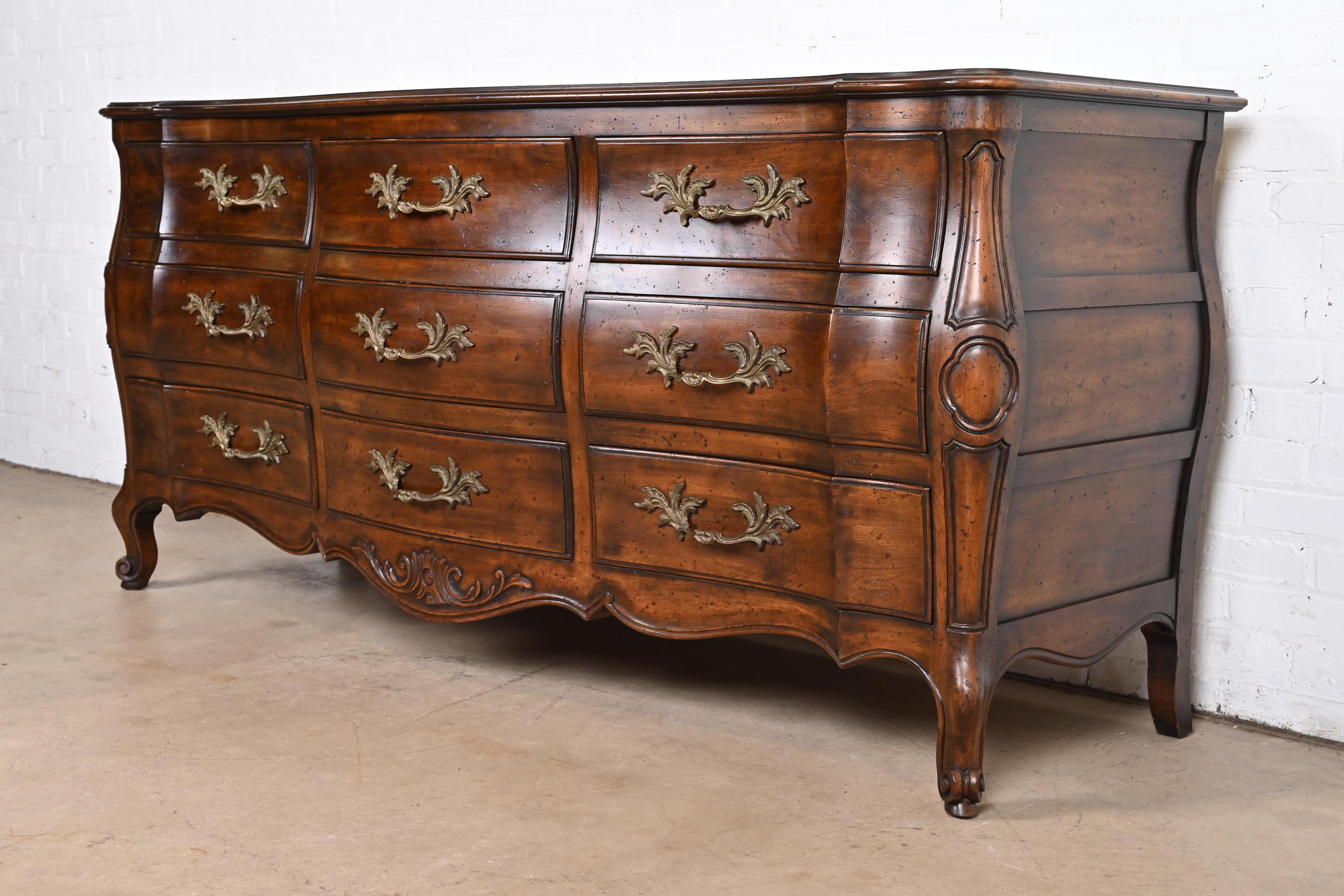 John Widdicomb French Provincial Louis XV Carved Walnut Triple Dresser, 1960s In Good Condition For Sale In South Bend, IN