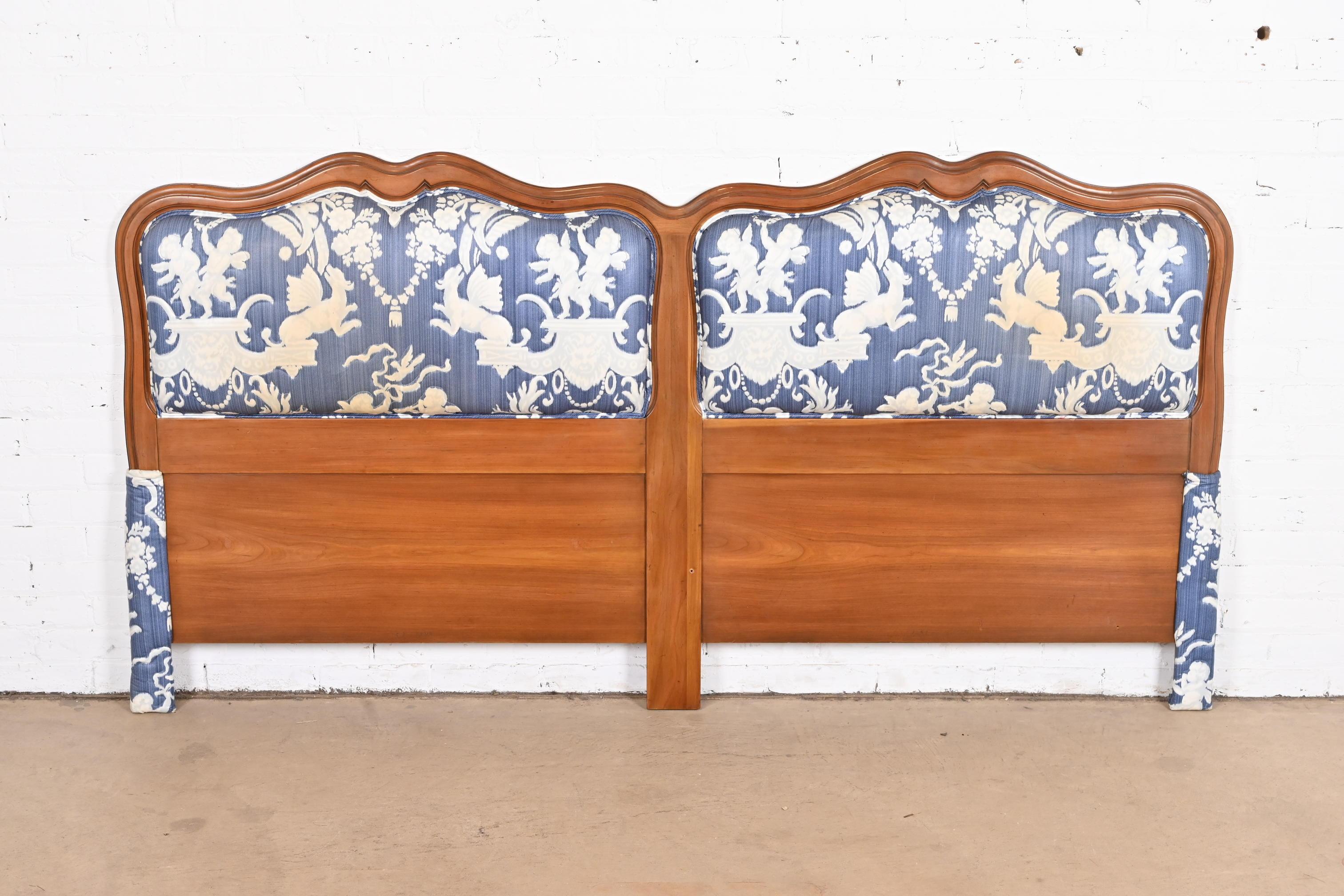 A gorgeous French Provincial Louis XV style king size headboard

By John Widdicomb

USA, 1950s

Carved solid cherry wood, with blue and white upholstery.

Measures: 79