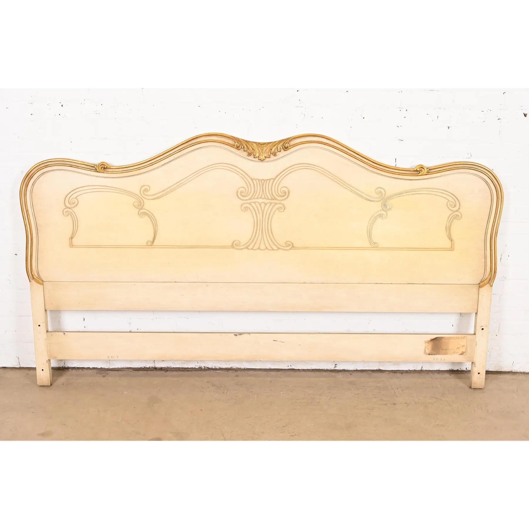 A gorgeous French Rococo or French Provincial Louis XV style king size headboard

By John Widdicomb

USA, Circa 1950s

Solid carved cherry wood, with original cream lacquered and gold gilt finish.

Measures: 80.75