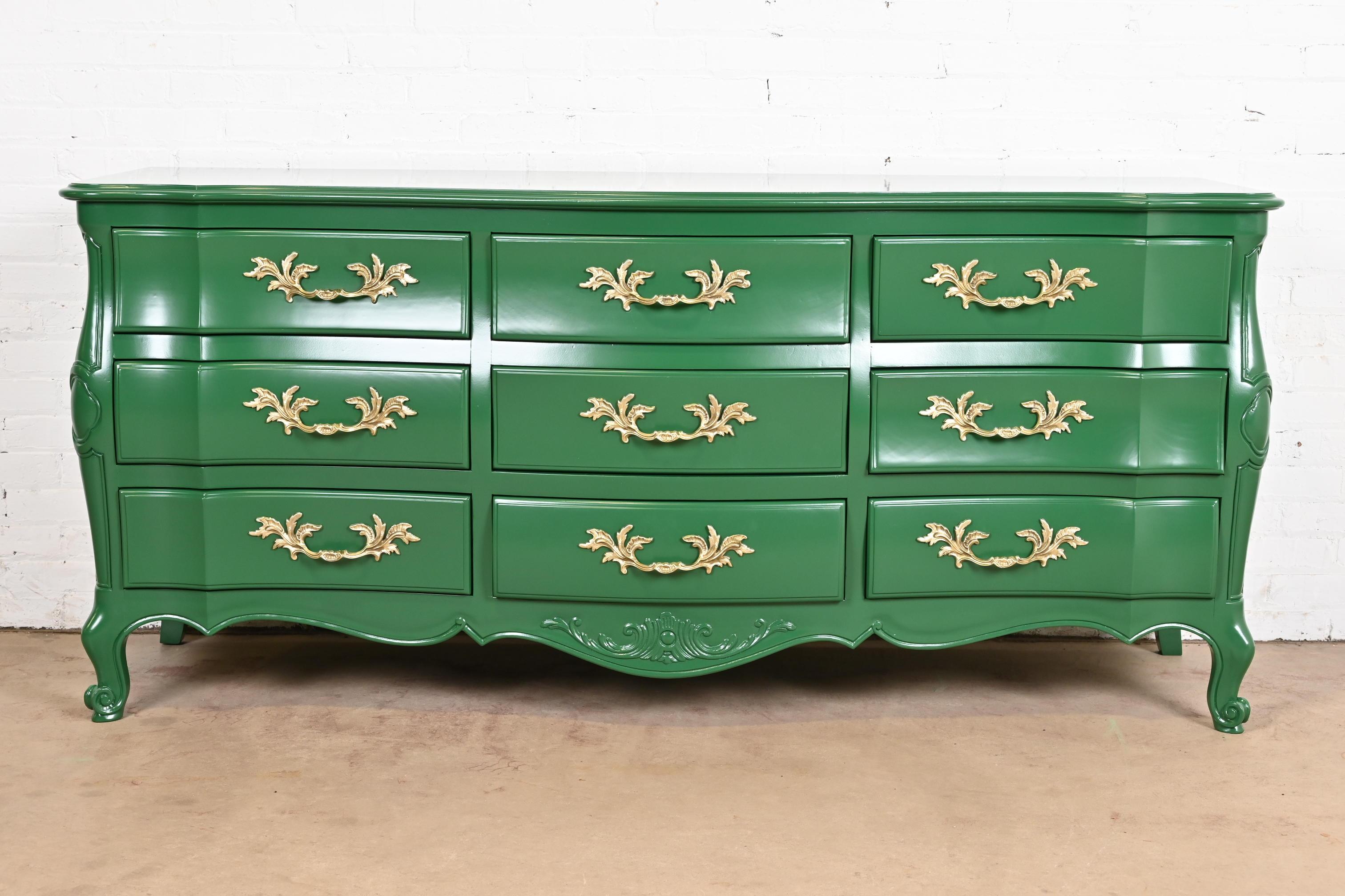 An exceptional French Provincial Louis XV style nine-drawer dresser, credenza, or chest of drawers

By John Widdicomb

USA, Circa 1980s

Green lacquered solid cherry wood, with original brass hardware.

Measures: 74.5