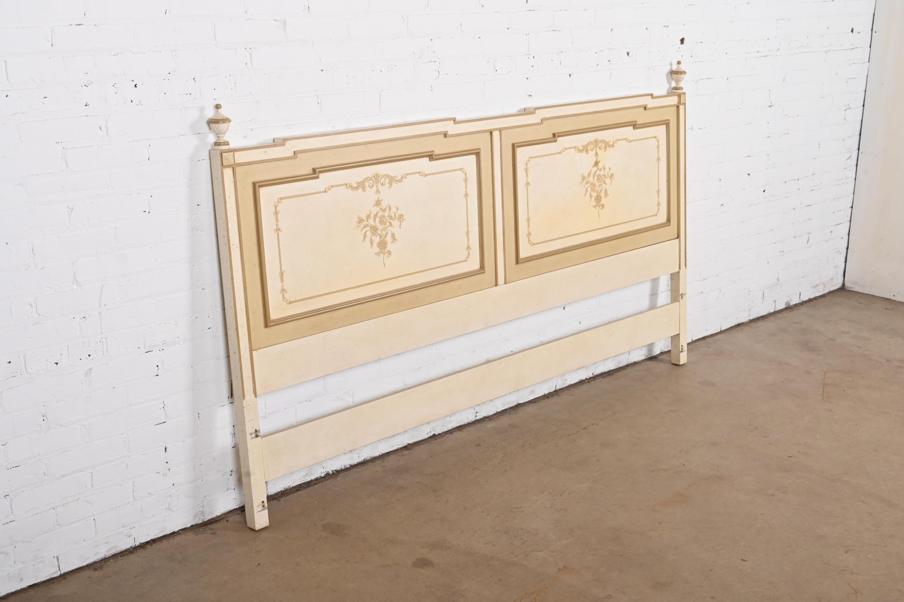 A gorgeous French Regency Louis XVI style hand painted king size headboard

By John Widdicomb

USA, Circa 1960s

Carved walnut in cream and taupe, with hand painted floral patterns.

Measures: 79.5