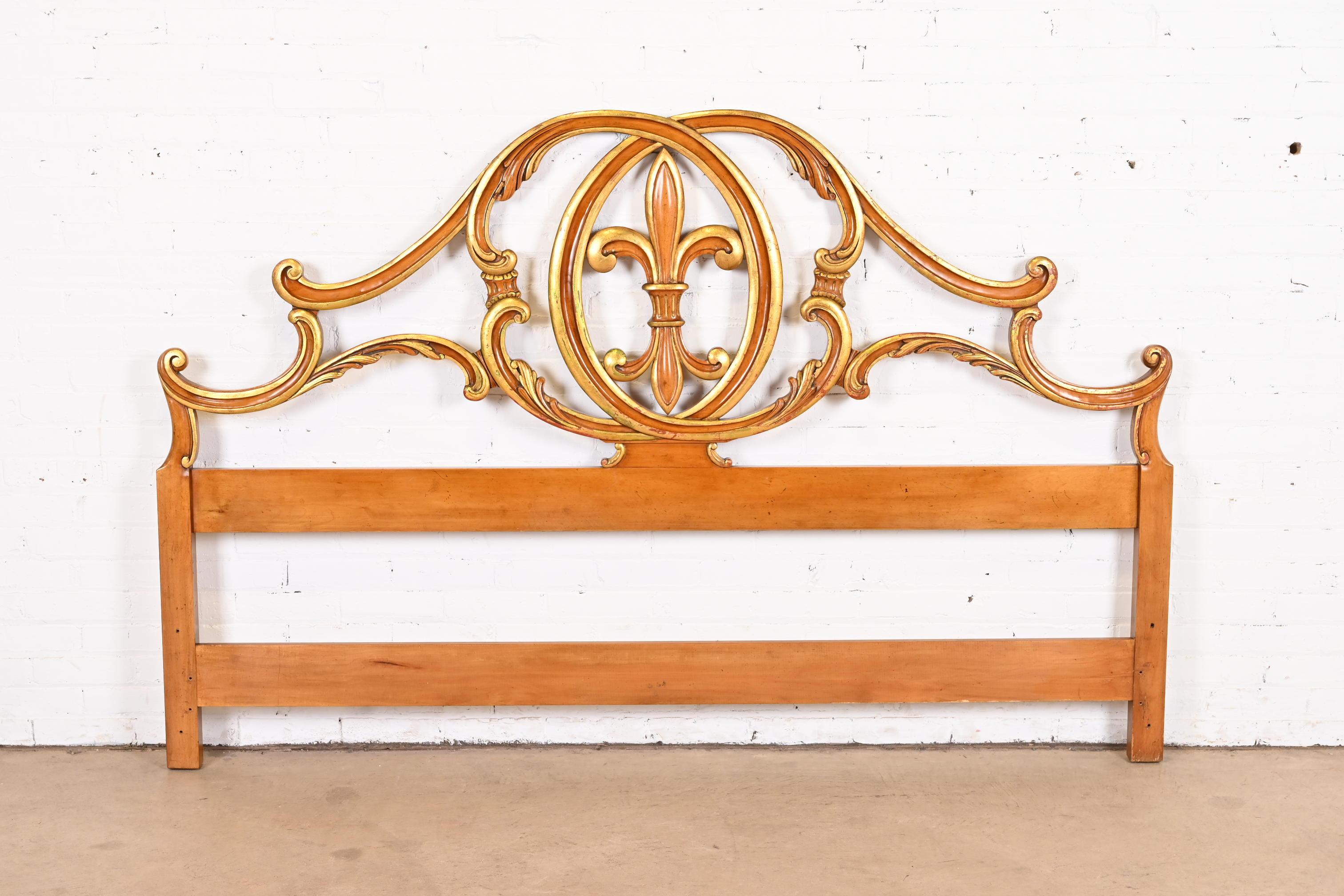 A gorgeous French Provincial or French Rococo Louis XV style king size headboard

By John Widdicomb

USA, Circa 1960s

Carved solid cherry wood, with gold gilt accents.

Measures: 79.5