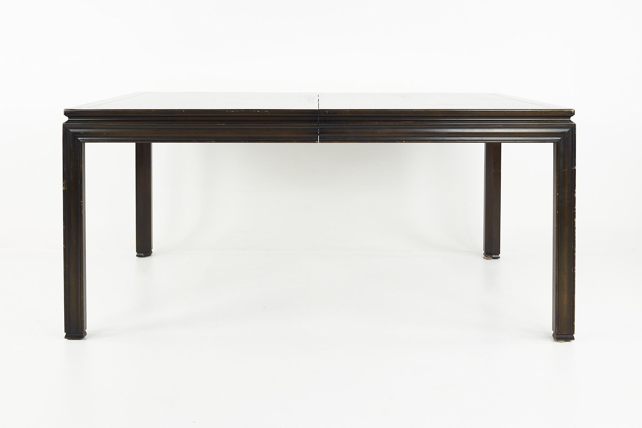 John Widdicomb mid century expanding dining table with 3 leaves

The table measures: 64 wide x 42 deep x 29.25 high, with a chair clearance of 25 inches; each leaf is 18 inches wide, making a maximum table width of 118 inches when all three leaves