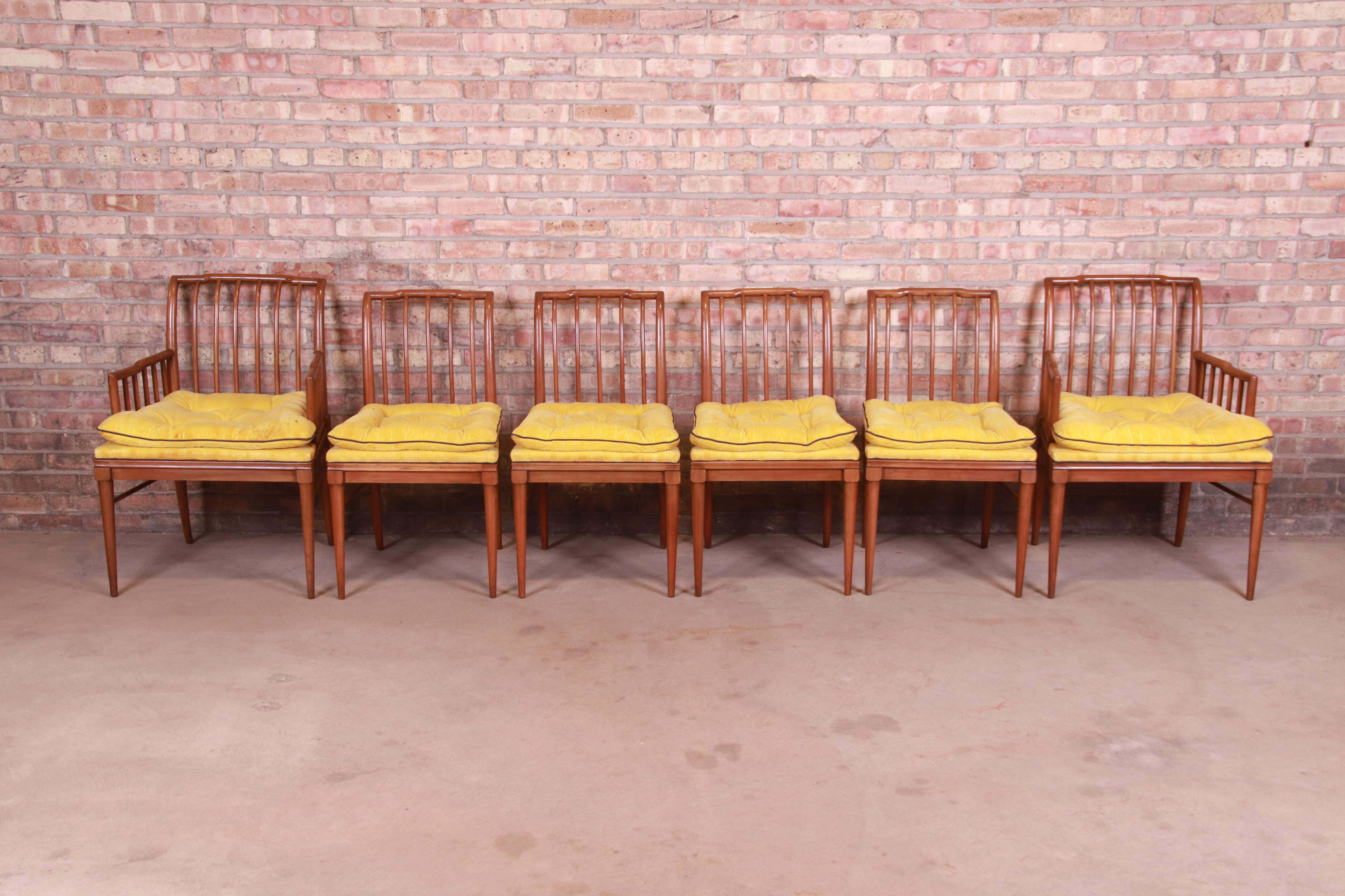 A gorgeous set of six Mid-Century Modern dining chairs

In the manner of T.H. Robsjohn-Gibbings

By John Widdicomb

USA, Circa 1950s

Sculpted walnut, with original yellow upholstered seats.

Measures:
Armchairs 24