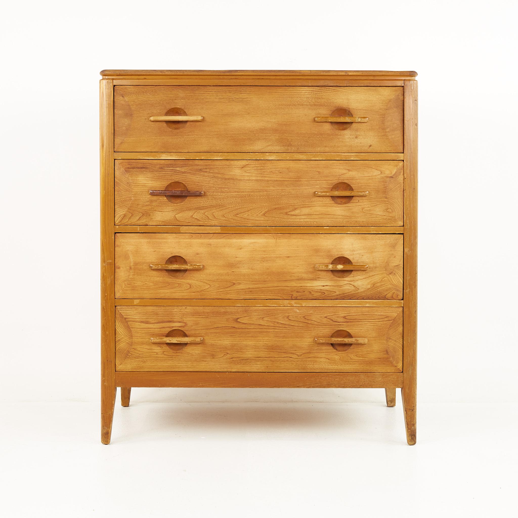 John Widdicomb Mid Century Oak 5 drawer highboy dresser

The dresser measures: 36 wide x 20 deep x 42.5 inches high

All pieces of furniture can be had in what we call restored vintage condition. That means the piece is restored upon purchase so