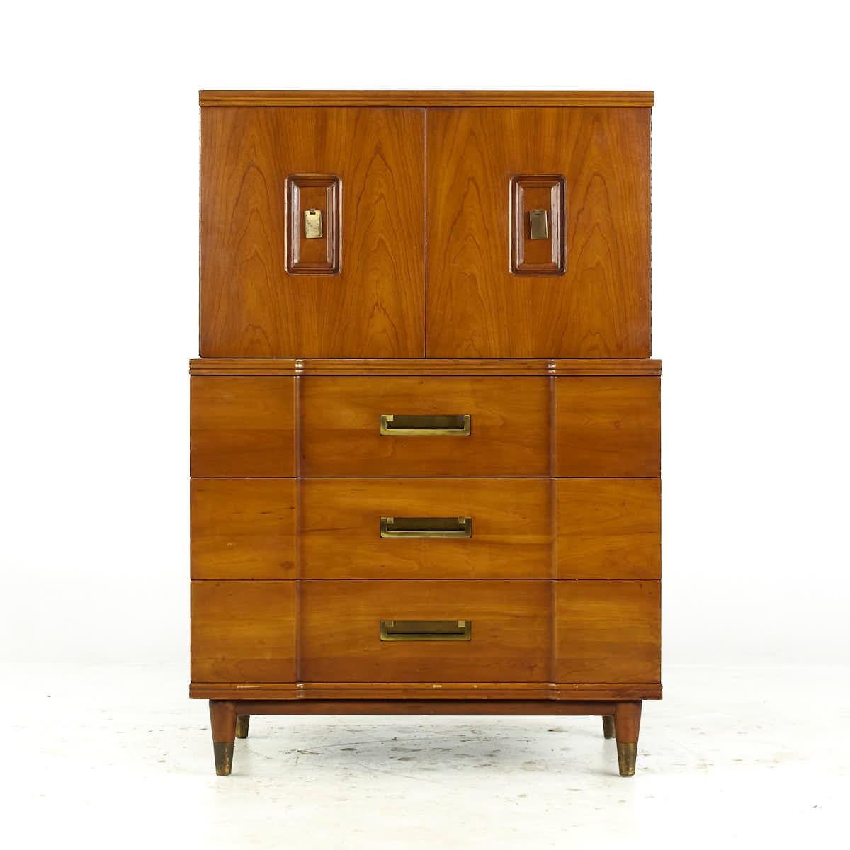 John Widdicomb Mid Century Walnut and Brass Highboy Dresser

This highboy measures: 36 wide x 21 deep x 52.5 inches high

All pieces of furniture can be had in what we call restored vintage condition. That means the piece is restored upon purchase