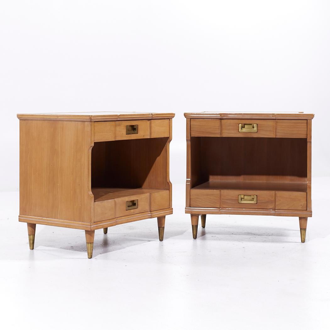 John Widdicomb Mid Century Walnut and Brass Nightstands - Pair

Each nightstand measures: 25 wide x 18 deep x 24.5 inches high

All pieces of furniture can be had in what we call restored vintage condition. That means the piece is restored upon