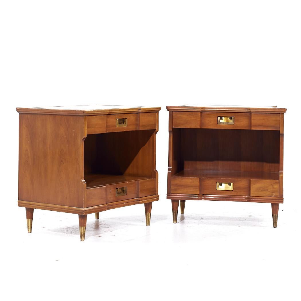 John Widdicomb Mid Century Walnut and Brass Nightstands - Pair

Each nightstand measures: 25 wide x 18 deep x 24.75 inches high

All pieces of furniture can be had in what we call restored vintage condition. That means the piece is restored upon