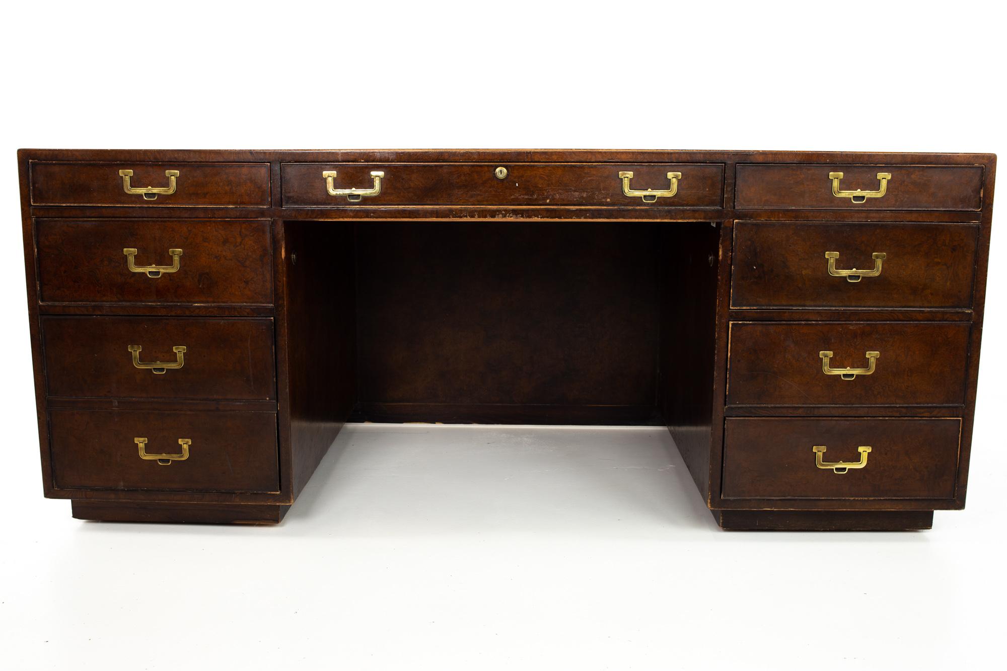 John Widdicomb Mid Century burlwood Campaign executive desk.
Desk measures: 72 wide x 36 deep x 30 inches high

All pieces of furniture can be had in what we call restored vintage condition. This means the piece is restored upon purchase so it’s