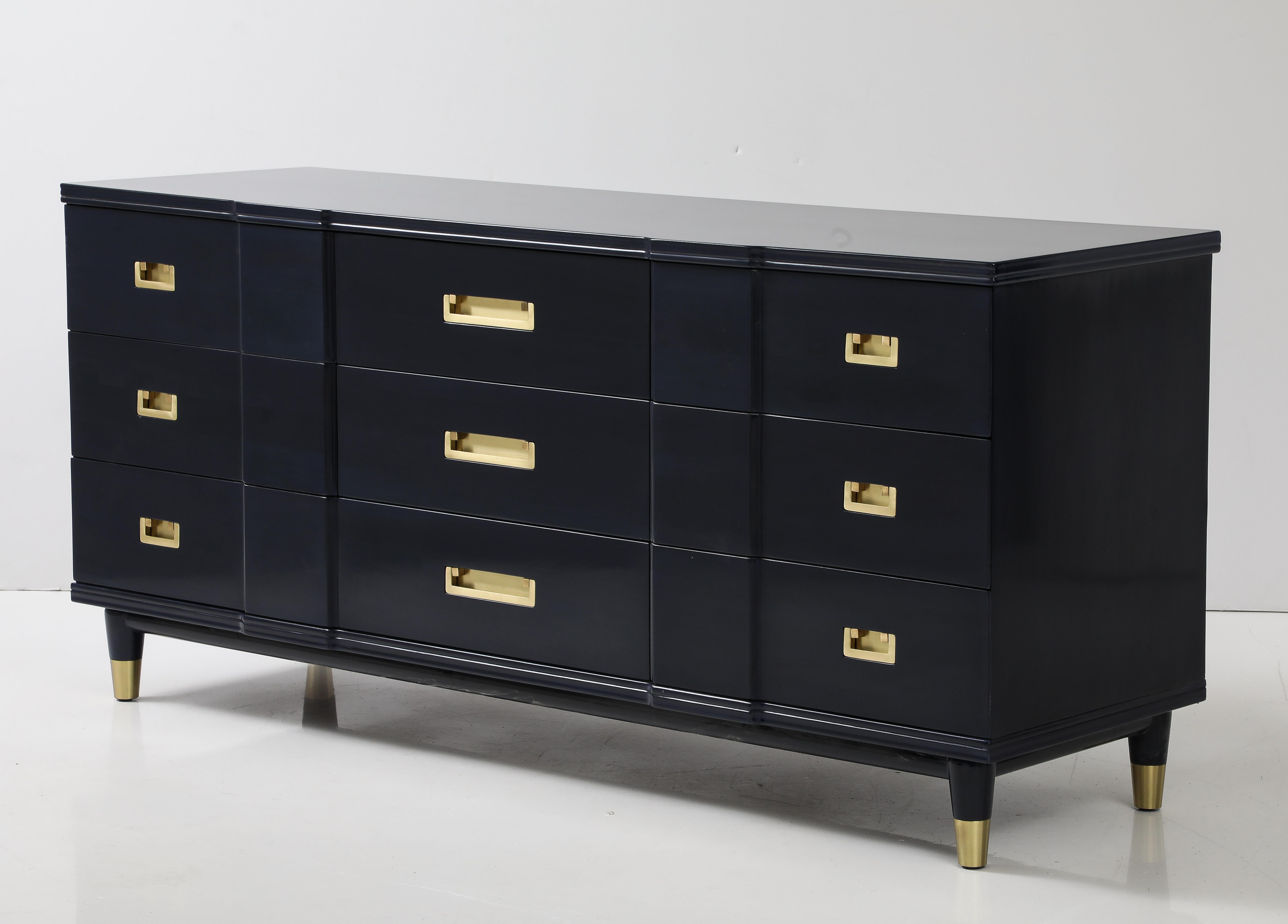 Mid Century solid Cherry wood dresser custom stained updatred in a dark Sapphire Midnight Blue. The brass hardware has been professionally updated in a satin finish. The 9 drawers provide ample storage. Mint restored 