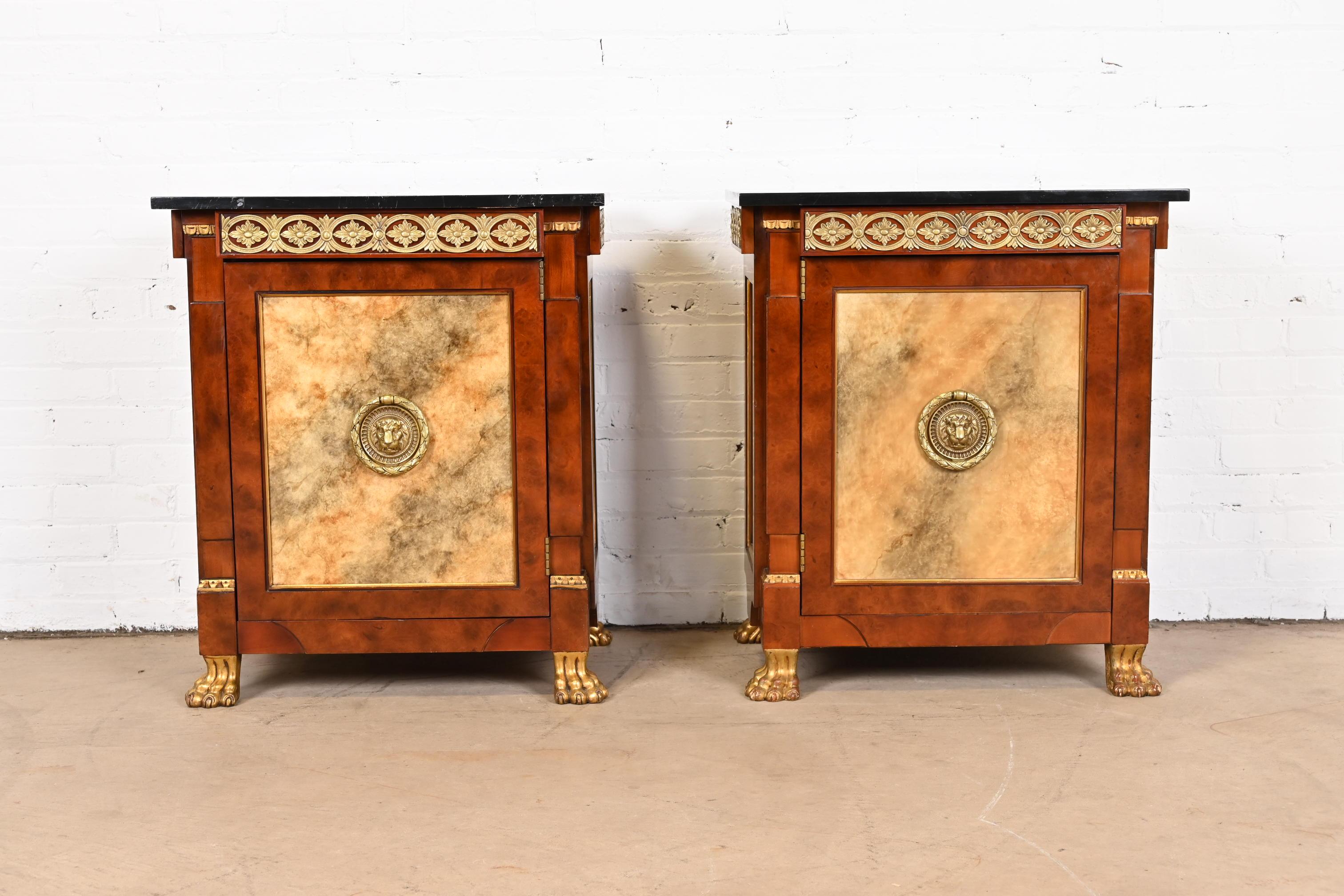 An outstanding pair of Neoclassical or Empire style cabinets or bedside chests

By John Widdicomb

USA, Late 20th Century

Gorgeous burl wood cases, with faux marble tops and panels, mounted brass ormolu, original brass hardware, and giltwood