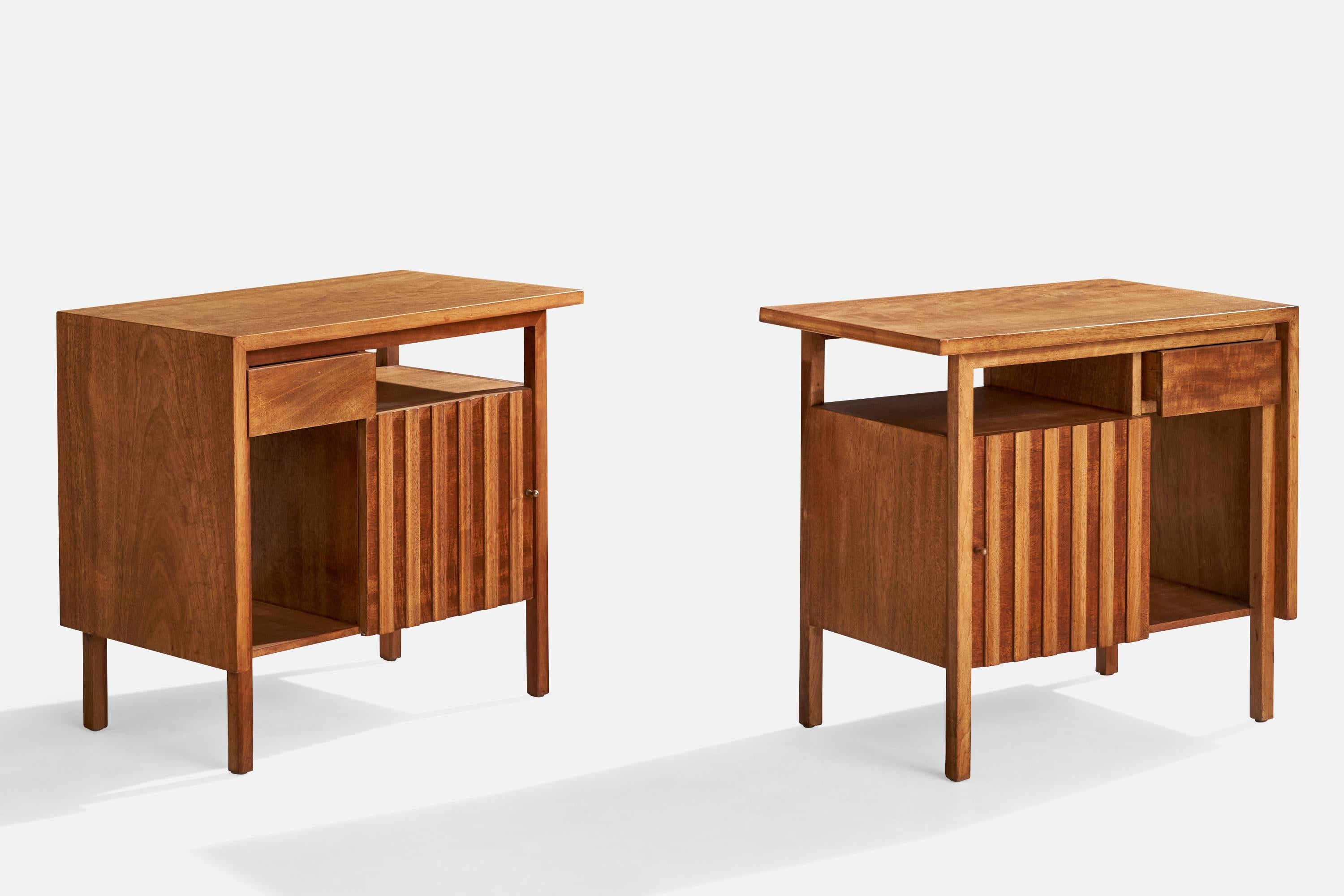 A pair of walnut nightstands produced by John Widdicomb, USA, c. 1950s.

Dimensions: 23.75” H x 26” W x 16” D