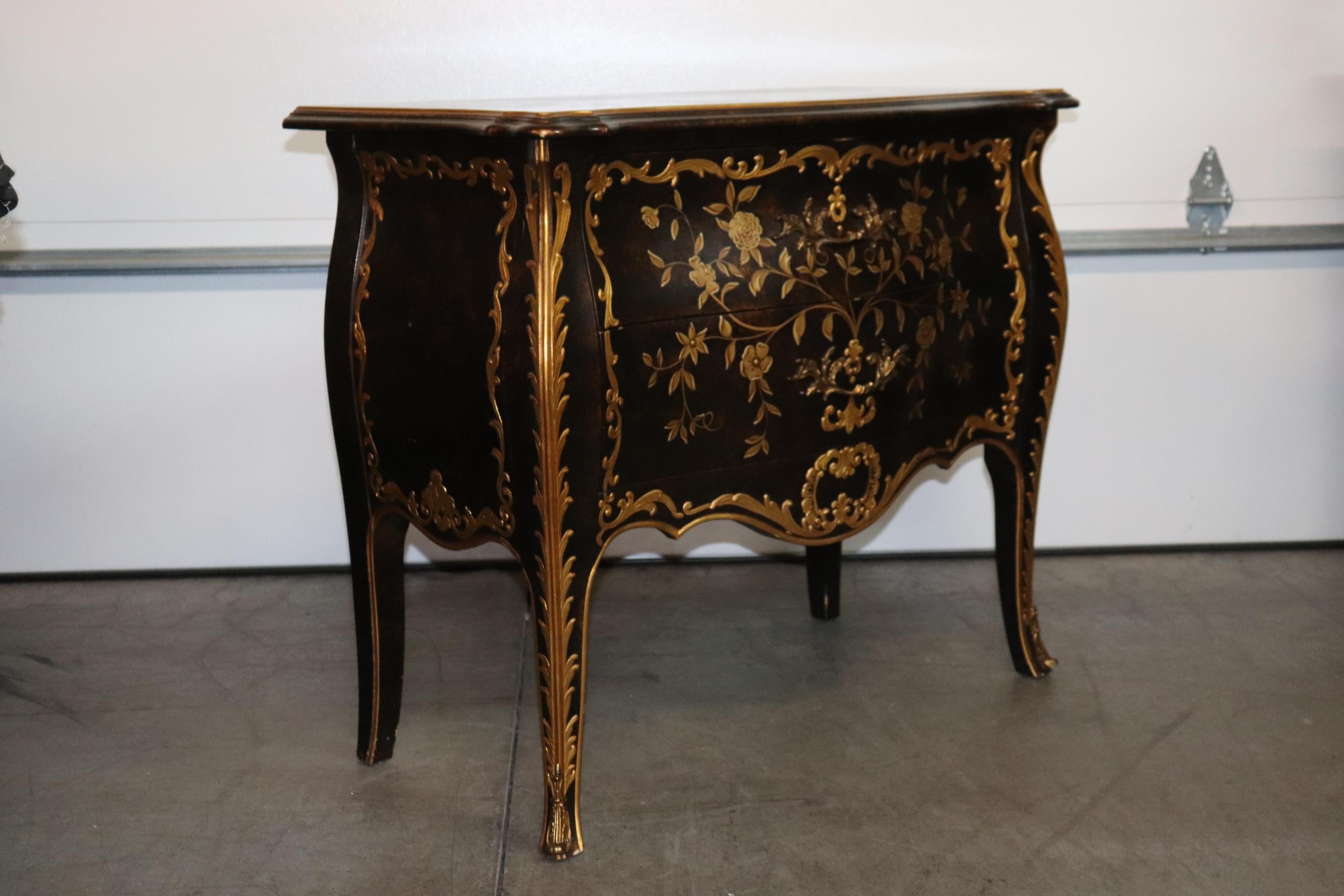 This is a superbly hand-painted masterpiece by one of the nation's finest manufacturers of furniture, John Widdicomb. The commode is designed in the Louis XV style and features wonderful bronze ormolu and the design is stunning. The piece measures
