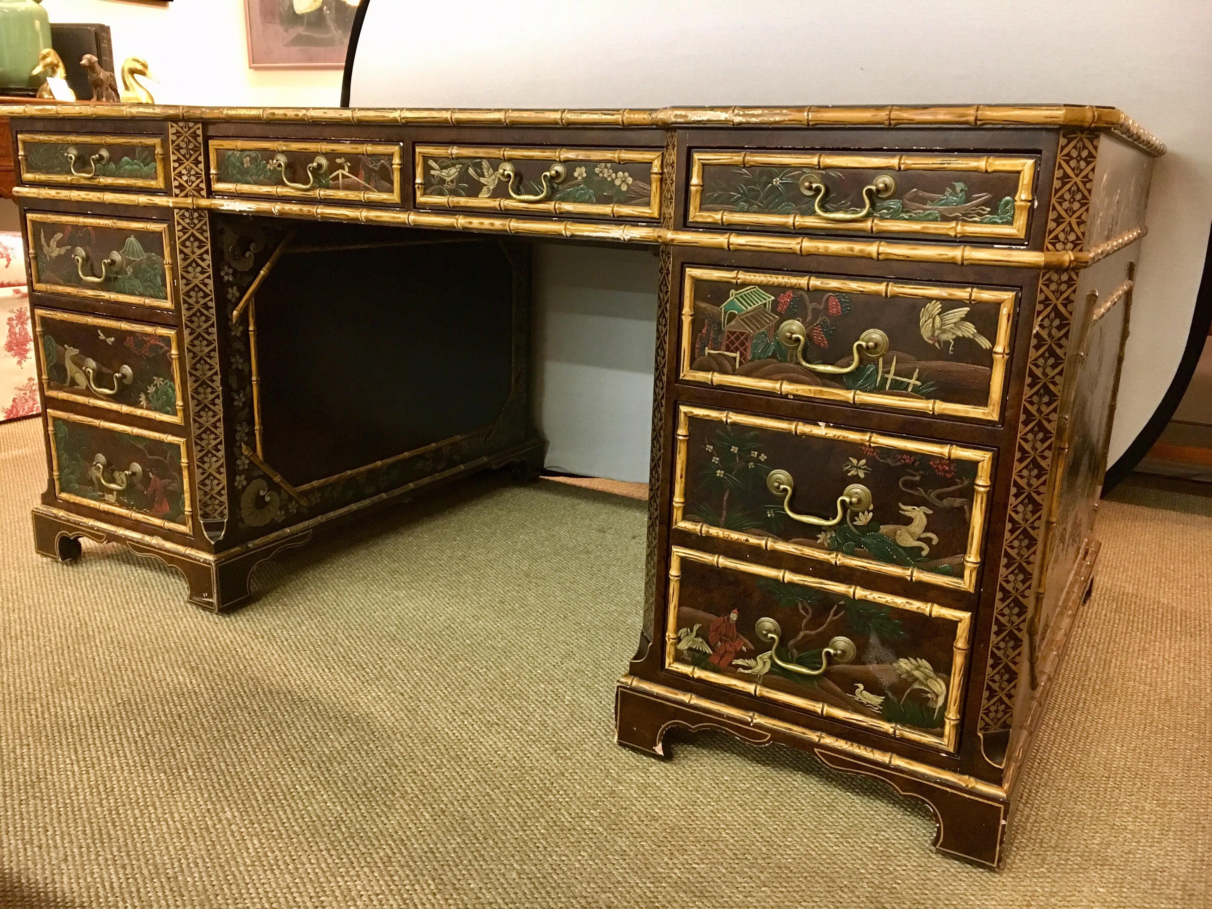 Rare oil painted Chinoiserie partners desk made by John Widdicomb. Features drawers and cabinets on both sides of the desk. It is oil painted all the way around, including the inside cabinets, doors and walls. The top of the desk is made from hand