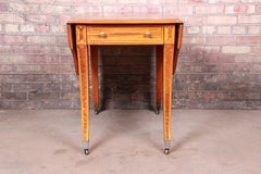 John Widdicomb Regency Inlaid Satinwood and Mahogany Saber Leg Pembroke Table