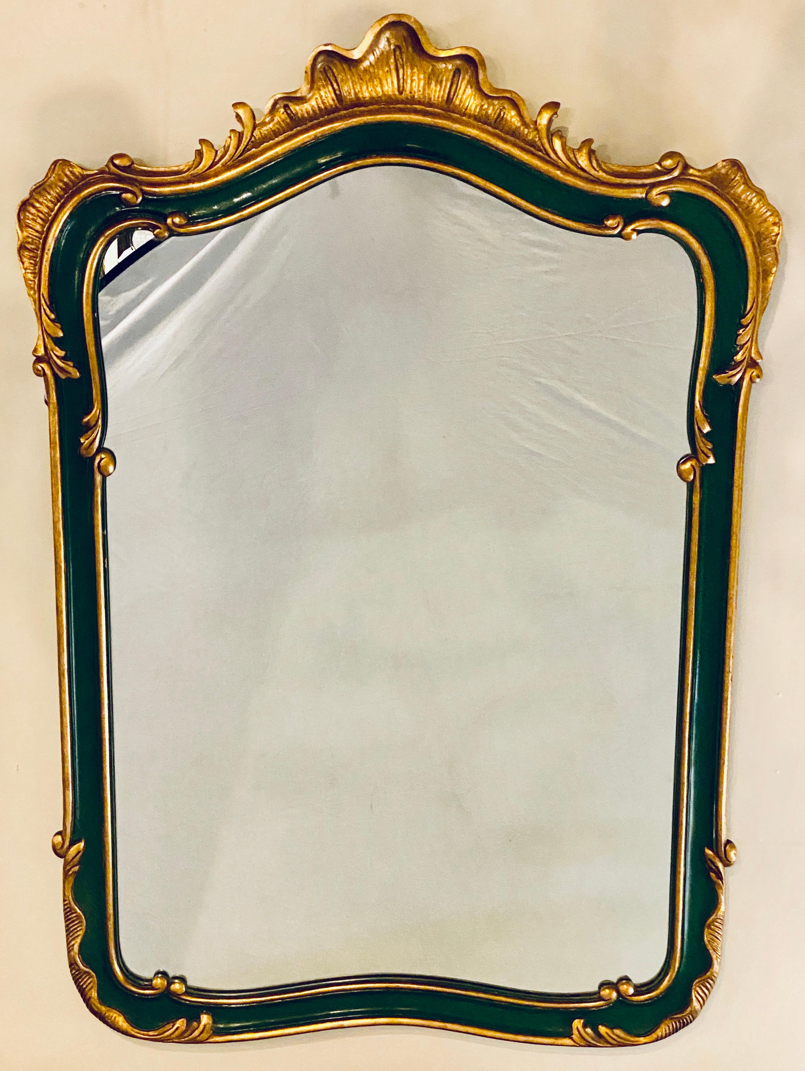 John Widdicomb parcel gilt and decorated chinoiserie shell carved wall / console mirror.
GXA.