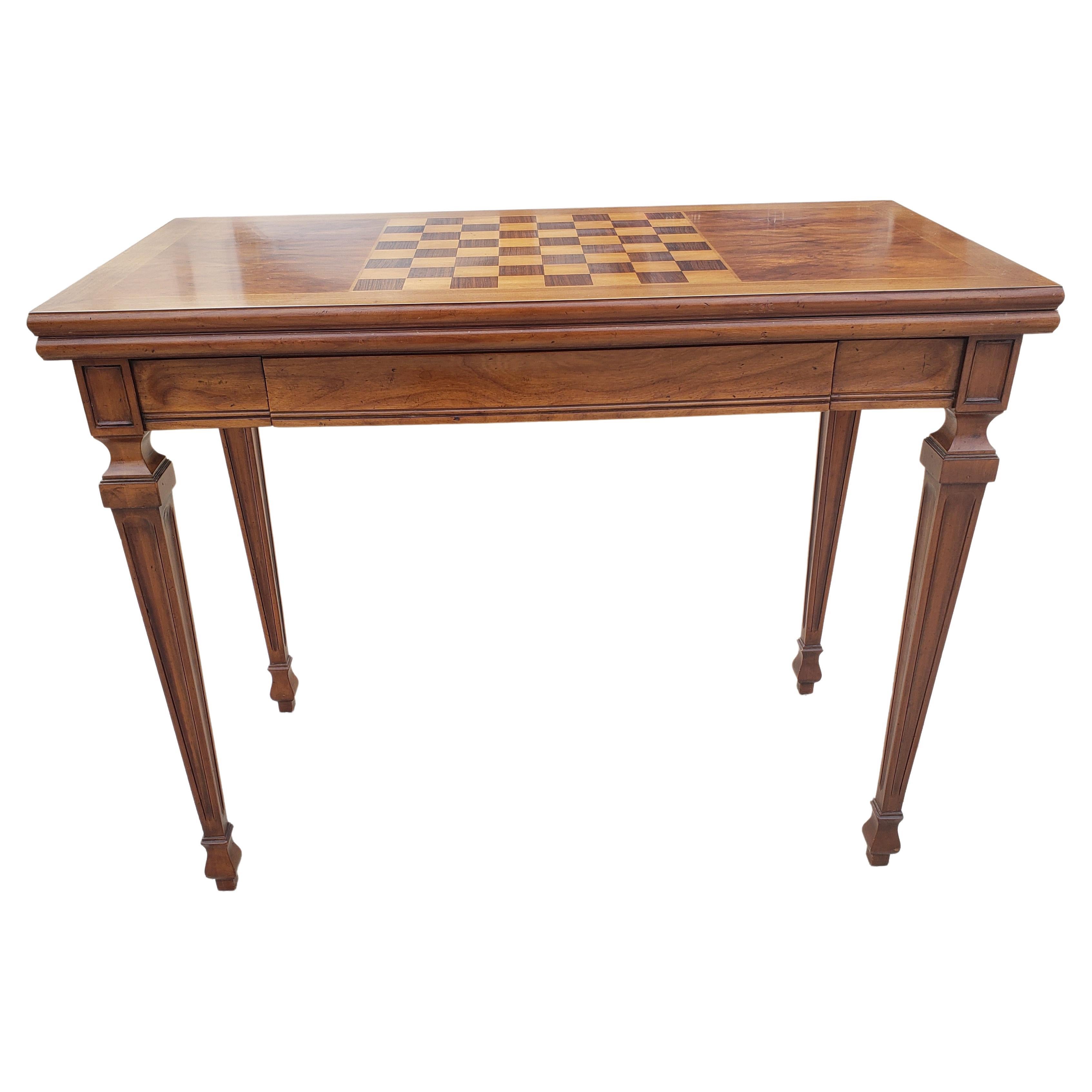 Beautiful John Widdicomb solid walnut and satinwood Marquetry console or game table.
Iconic watertown slides to pull from the back and flip top for game table, card table or small dining card table. Large drawer for storage.
Top chess board with