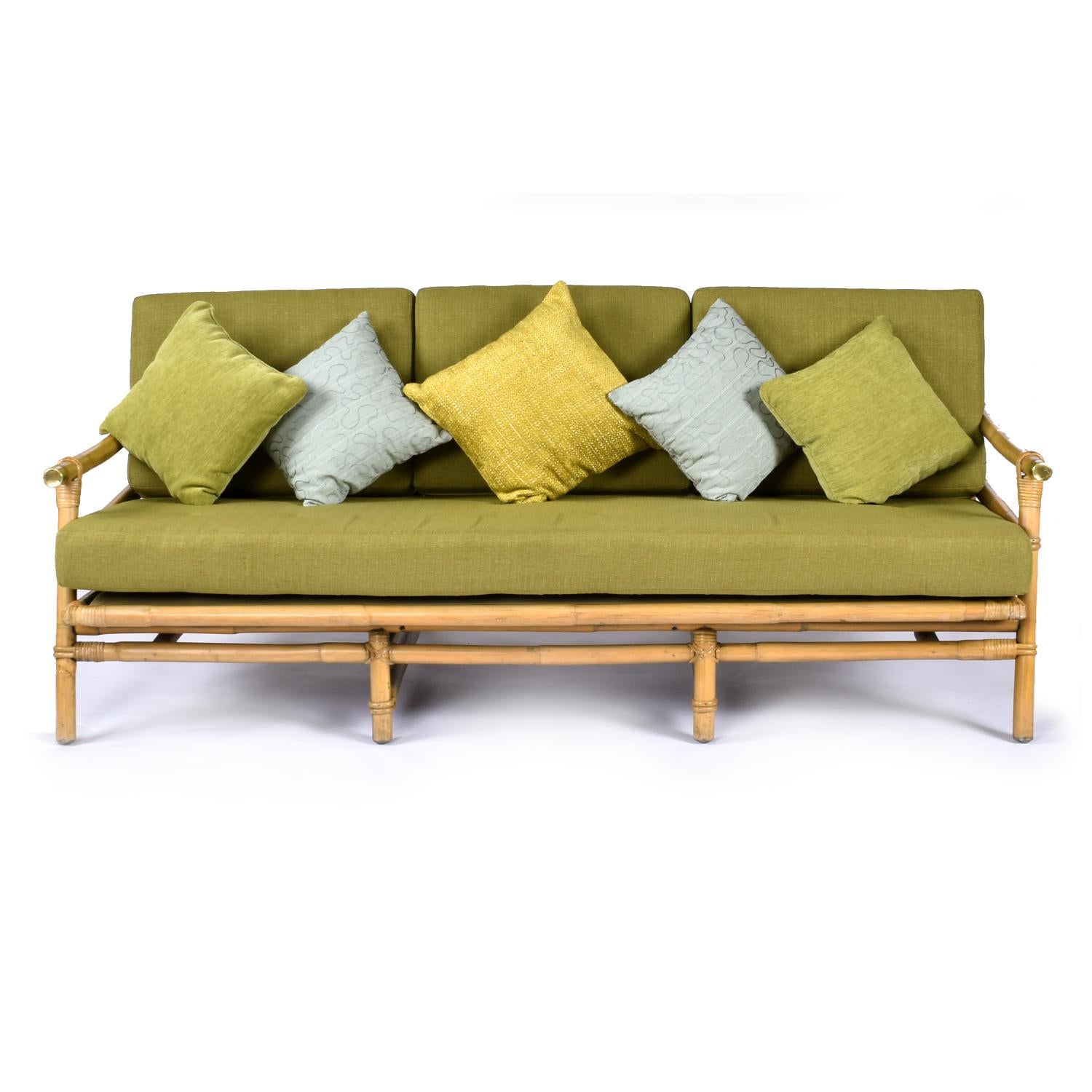 Luxurious bamboo sofa by John B. Wisner for Ficks Reed. Wisner’s “Far Horizons” collection was first introduced in 1954 and remains a desirable, timeless classic. Inspired by the tropical lands of the the East, this bamboo sofa features stylish