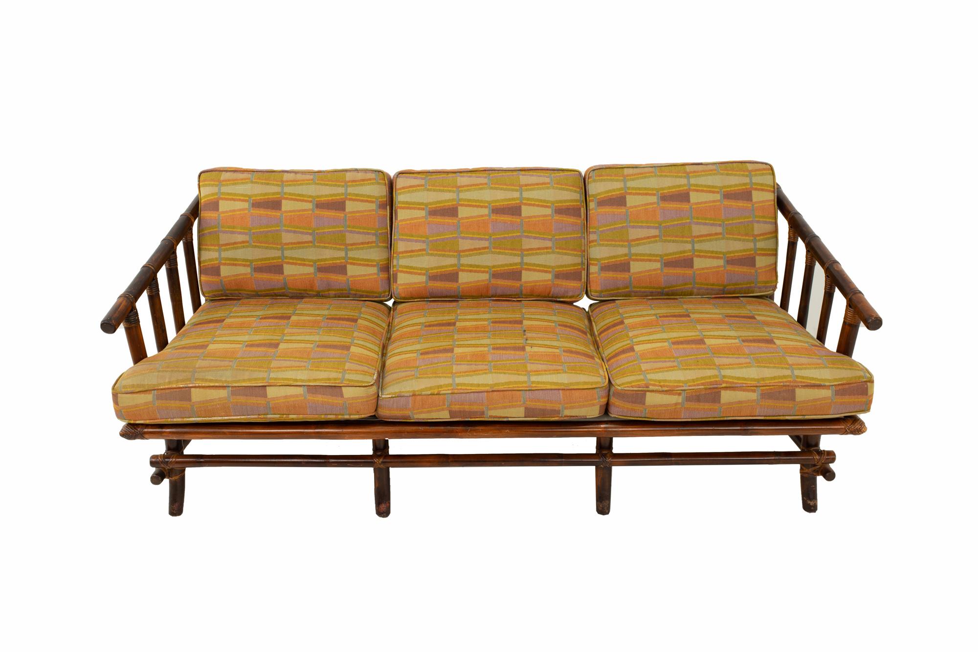 John Wisner for Ficks Reed style bamboo Mid Century 3-seat sofa
Sofa measures: 66 wide x 32 deep x 27 high

All pieces of furniture can be had in what we call restored vintage condition. This means the piece is restored upon purchase so it’s free of