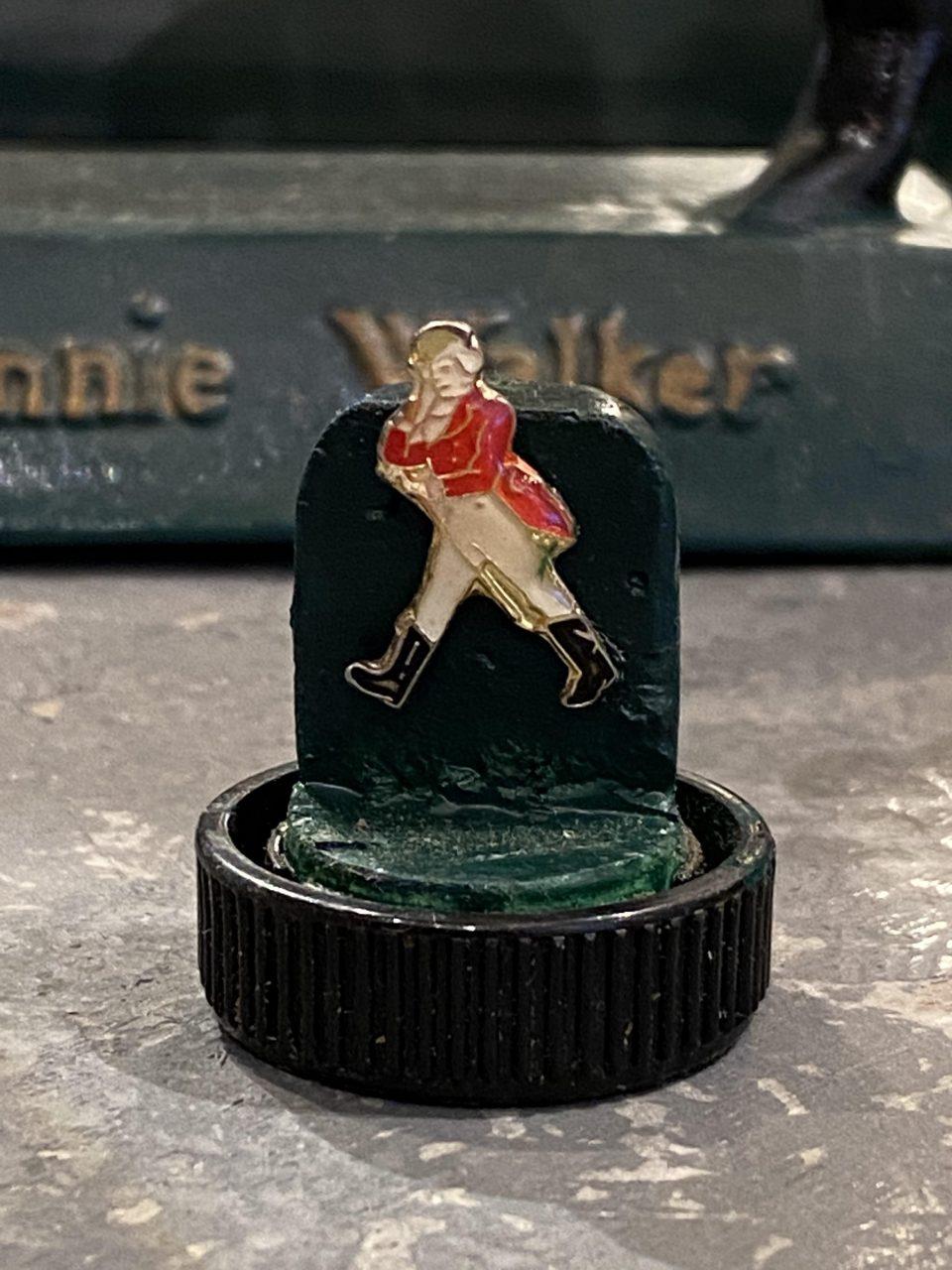 The world-famous and iconic figure – Johnnie Walker’s “The Striding Man” who walks energetically and purposefully, wearing his eye-catching red jacket, white riding breeches and black boots.

Wonderful collection of a total of 5 items from the