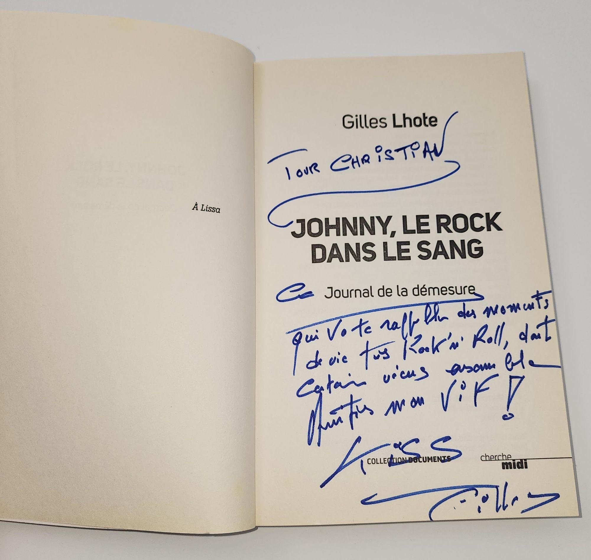 Johnny Halliday Rock in the Blood French Edition Signed by Gilles Lhote author, paperback book.Johnny Halliday, Rock in the Blood - French Edition - Dedication, signed by the author Gilles Lhote to fashion designer Christian Audigier.
Johnny