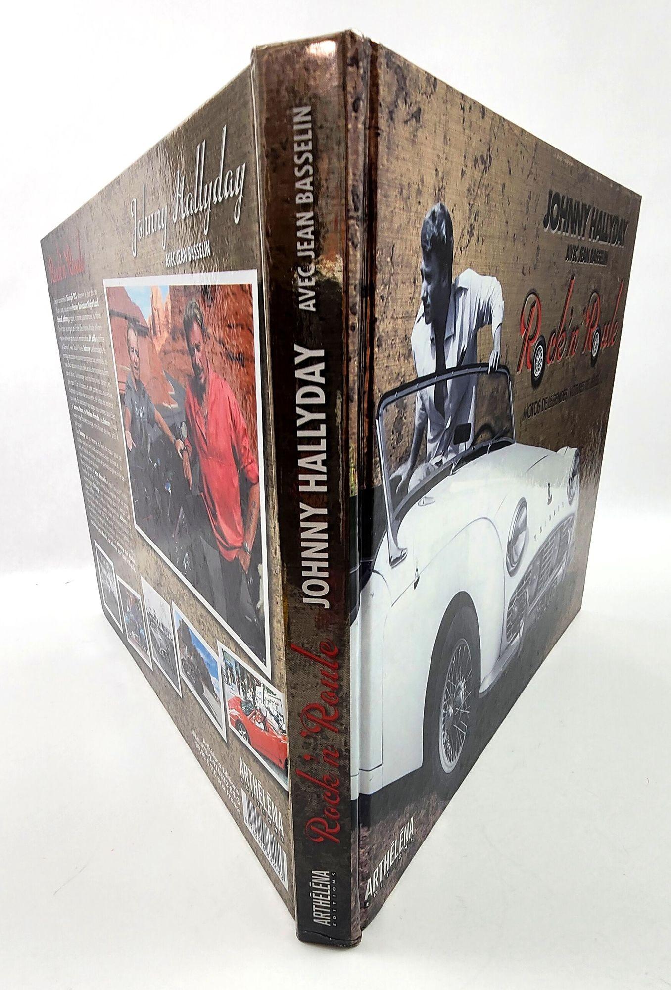 Johnny Halliday: Rock'n'Roule: Motos de légendes, voitures de rêves.(French Language) Collector Edition with postcards.
From his first Triumph TR3, as a gift on his 18th birthday, to his last Harley Davidson Night Road.
Special, Johnny has kept the