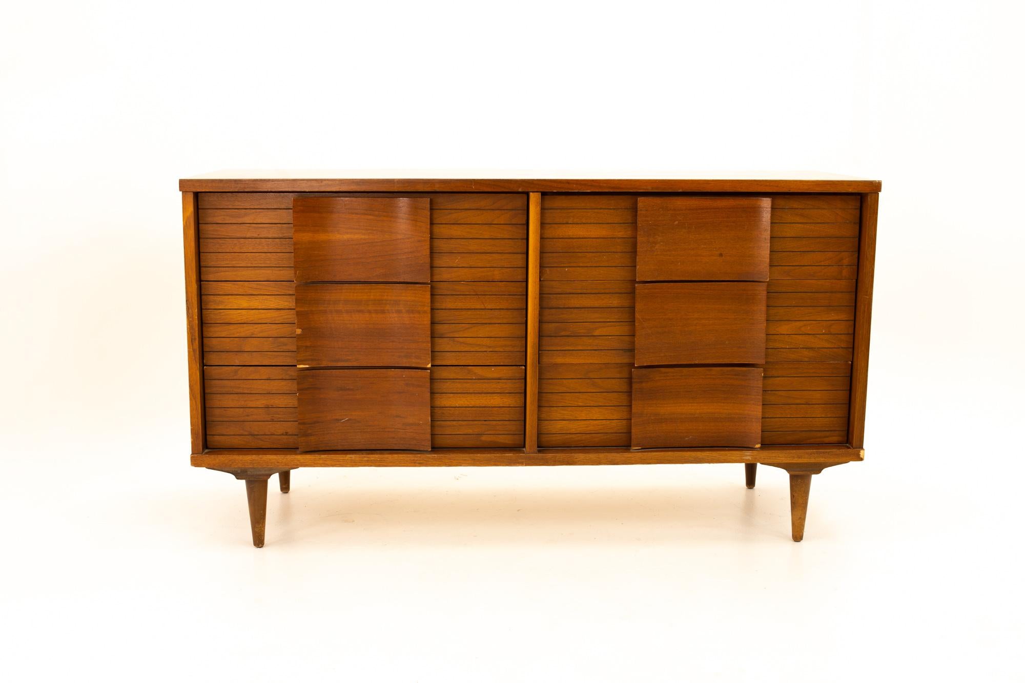 Johnson Carper mid century Formica top 6-drawer walnut lowboy dresser
Dresser measures: 54 wide x 17.75 deep x 30 high

This price includes getting this piece in what we call restored vintage condition. That means the piece is permanently fixed