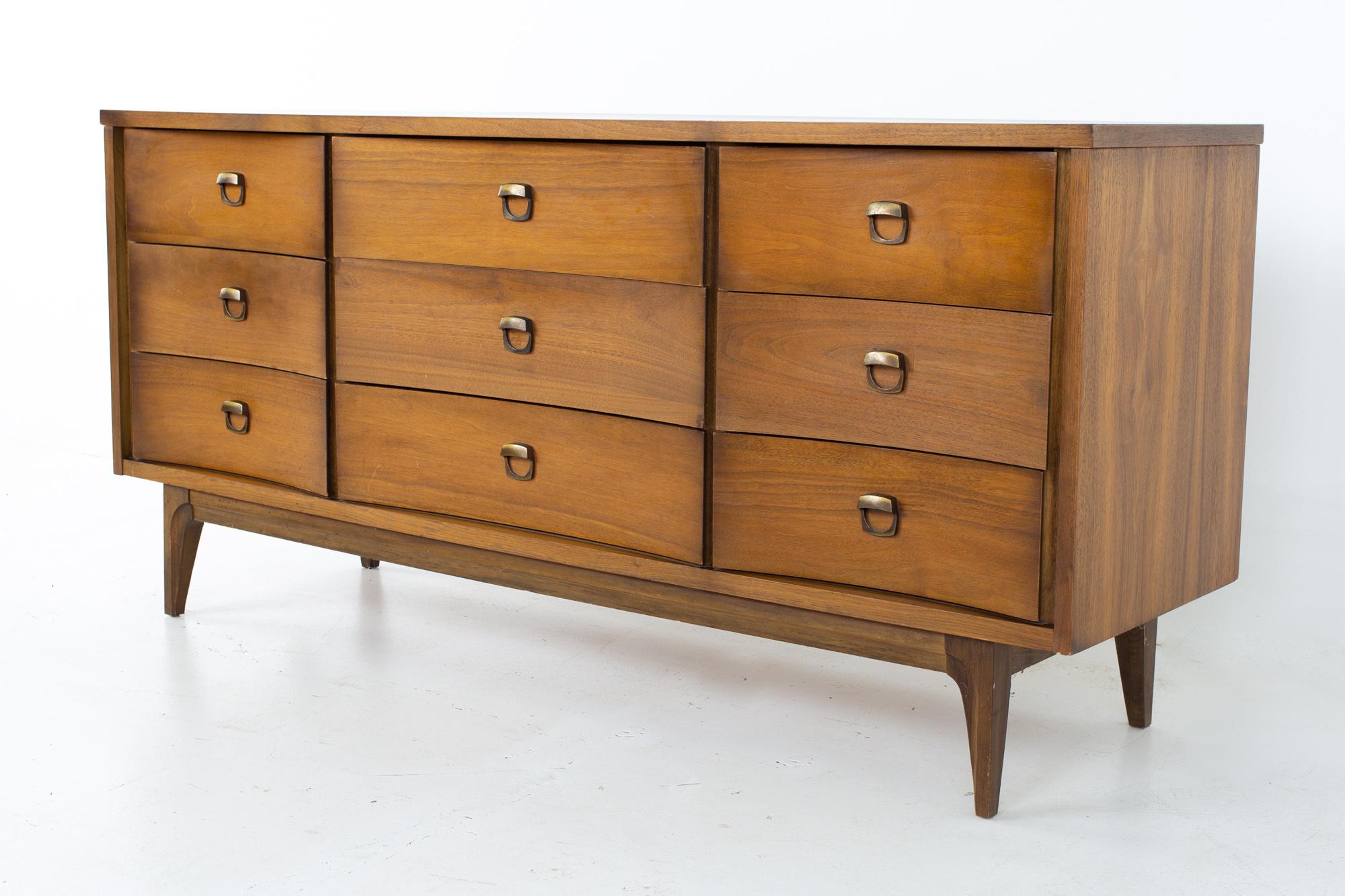 Johnson Carper Mid Century lowboy dresser
Dresser measures: 64 wide x 18 deep x 30 inches high

All pieces of furniture can be had in what we call restored vintage condition. That means the piece is restored upon purchase so it’s free of