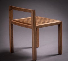 El taburete Jojo. Diseño brasileño en madera maciza y marquetería de Amilcar Oliveira