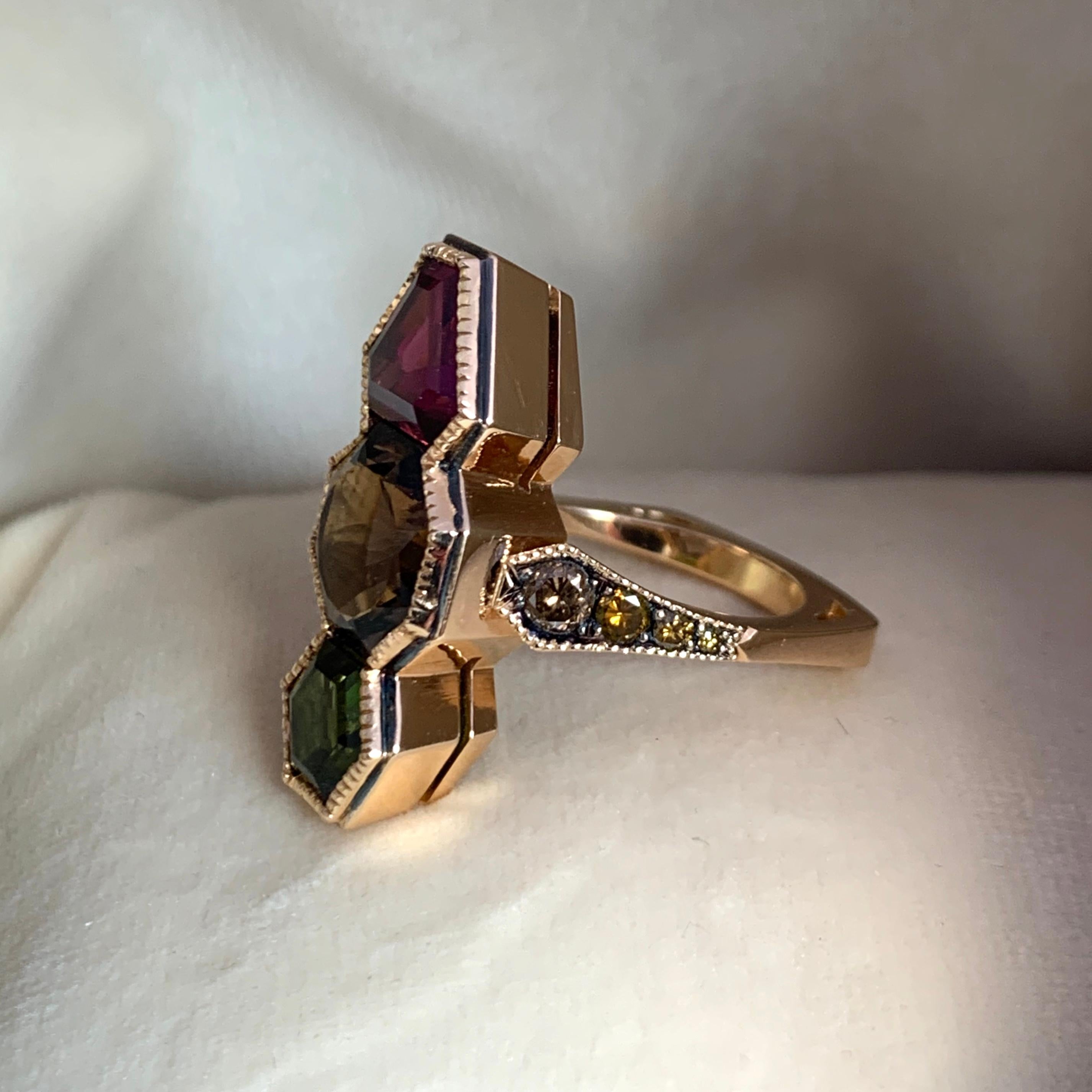 One of a kind Millegrain Ring in 18K Rose gold 10,6 g.  set with 2 hexagon cut Tourmalines, a hexagon cut Smokey Quartz, pave set cognac brilliant-cut diamonds 0,52 ct.,  Backside of the ring is made to prevent turning around the finger.  size EU