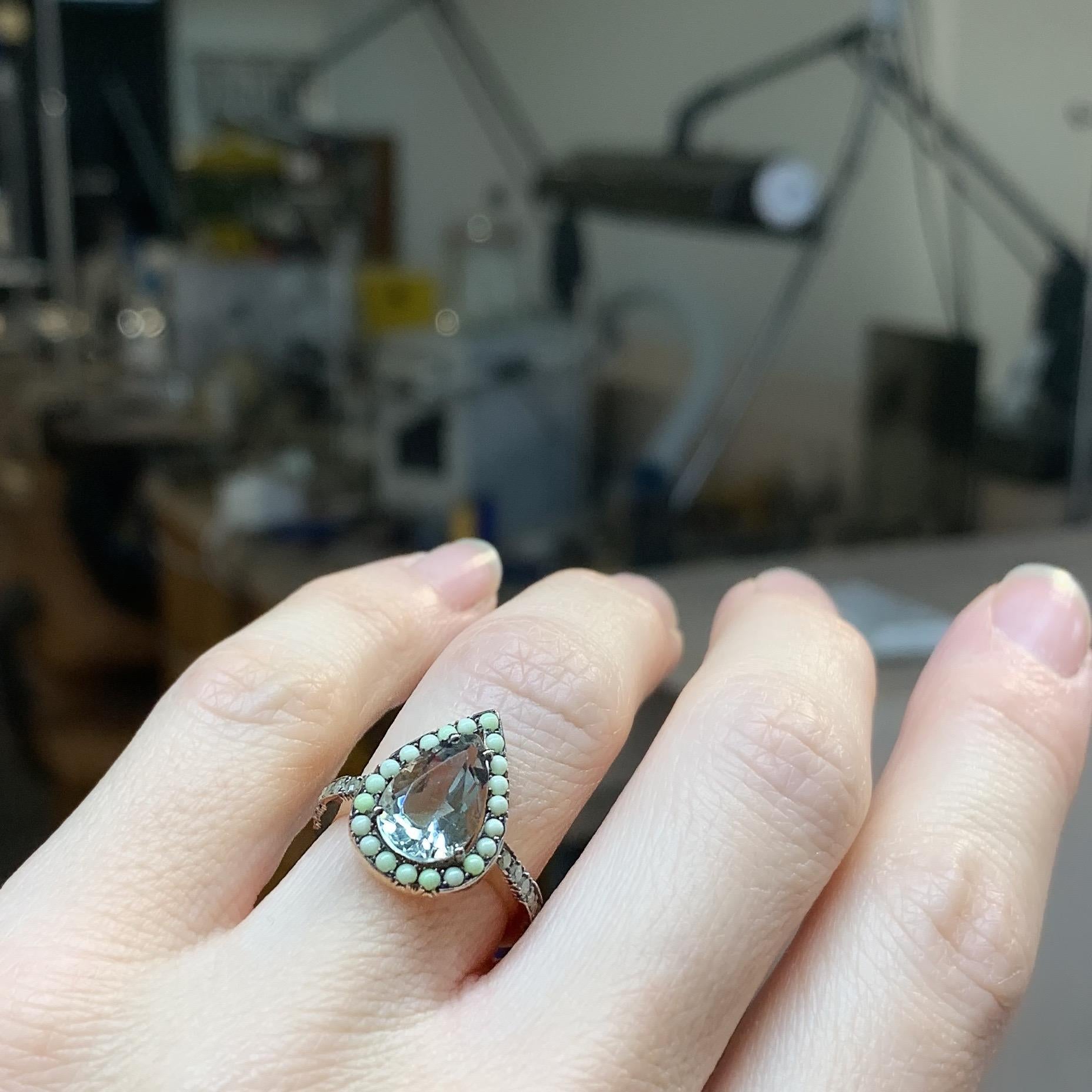 One of a kind ring in 18K Rose gold 5,9 g set with a pear shaped Prasiolite centerstone, Fancy yellow icy diamonds 0,18 ct. & Pave & Castle set Lemon Chrysophrase cabochons. The stonesetting is black rodium plated. Handmade the traditional way.