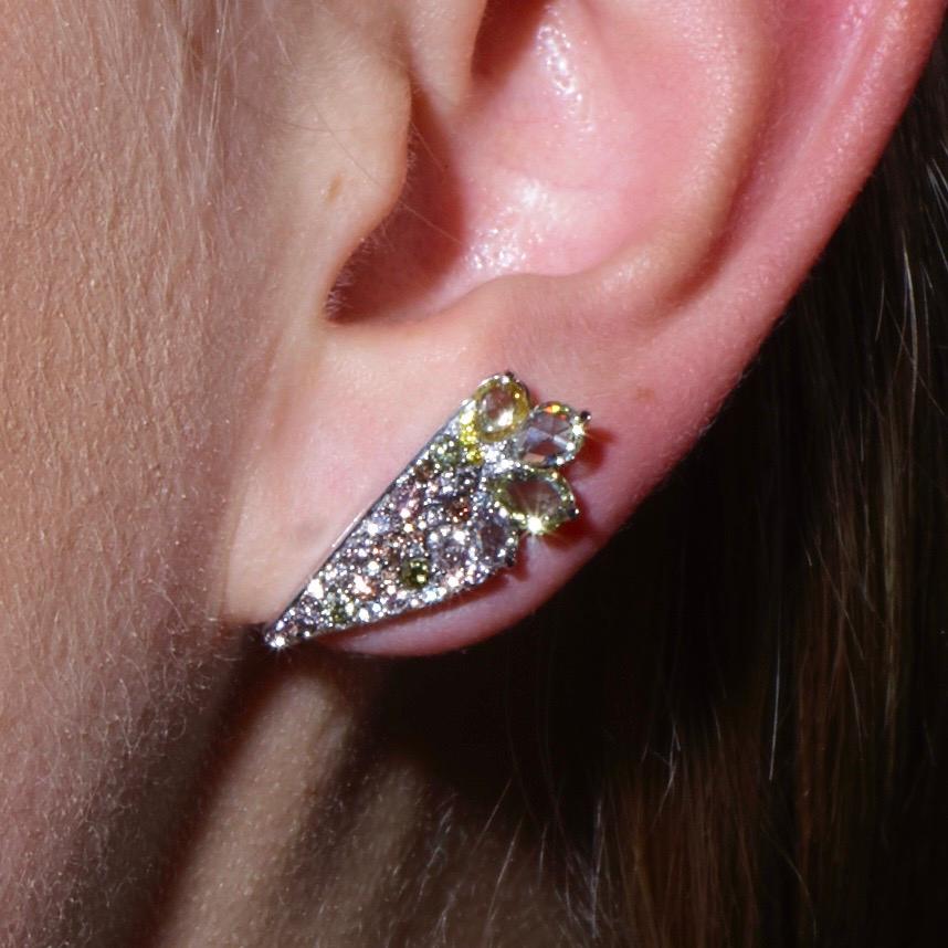 One of a kind Ear Cuffs in 18K White gold 9,8 g. set with pave natural Fancy Pink, Green, yellow & white DEGVVS brilliant-cut diamonds, Fancy Pink & Green & yellow rose-cut diamonds. Total carat diamonds: 2,71 ct. Handmade the traditional way, ajour