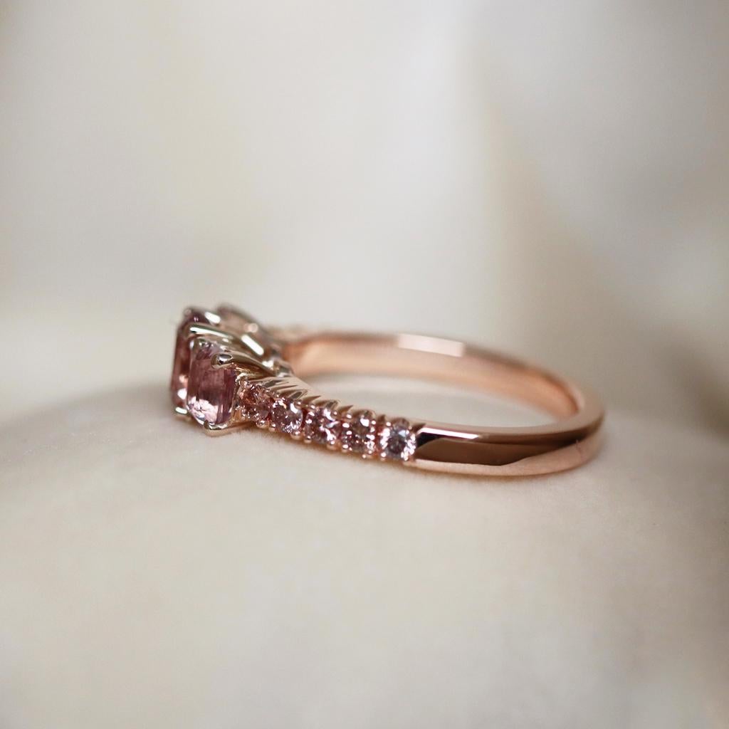 One of a kind Dusty Rose Pink Three Stone ring handmade in Belgium by jewellery designer Joke Quick,  in solid 18K Rose gold and handmade the traditional way ( no casting or printing involved ). Set with 3 unheated Burmese Spinels and pave set