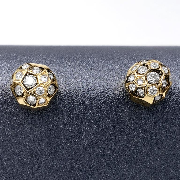Innervisions Stud Earrings handmade in Belgium by jewelry artist Joke Quick in 18k yellow gold featuring 0.27 total carats of inverted and traditionally-set superior-quality DE/vvs round brilliant-cut white diamonds. Stamped and hallmarked. Also