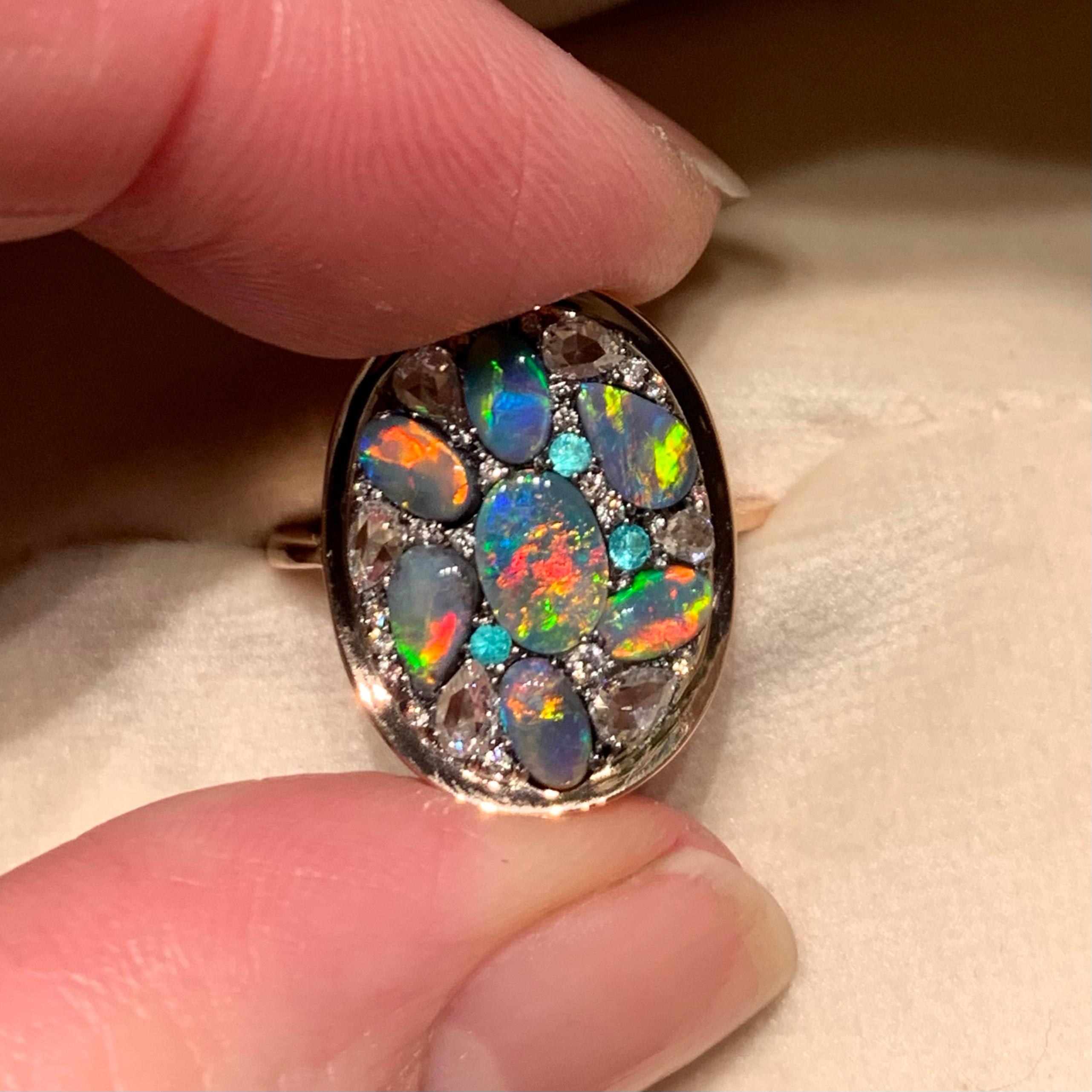 One of a kind ring handmade in Belgium by jewellery artist Joke Quick. Diamonds and gemstones in different cut shapes and colours are set like a mosaic. Handmade the traditional way, no casting or printing envolved.   
Ring in 18K Rose Gold 5,2 g &