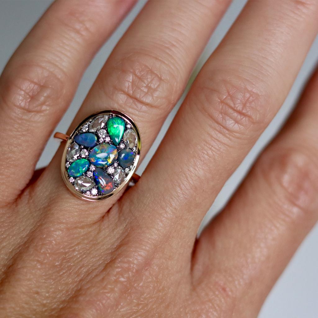 One of a kind ring handmade in Belgium by jewellery artist Joke Quick.  Diamonds and gemstones in different cut shapes and colours are set like a mosaic. This Ring is Handmade the traditional way, no casting or printing envolved.   

Ring in 18K