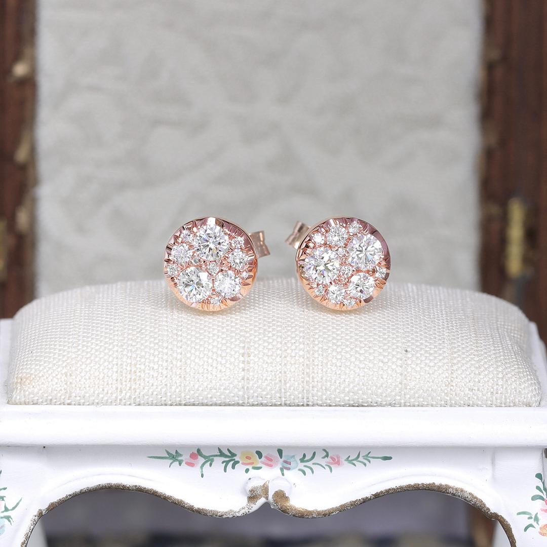 Handmade in Belgium, by jewellery designer Joke Quick, with no casting or printing involved, these Rose gold stud earrings feature 24 natural DEGVVS brilliant cut diamonds pave set in different sizes. Each stone is placed with precision, creating a