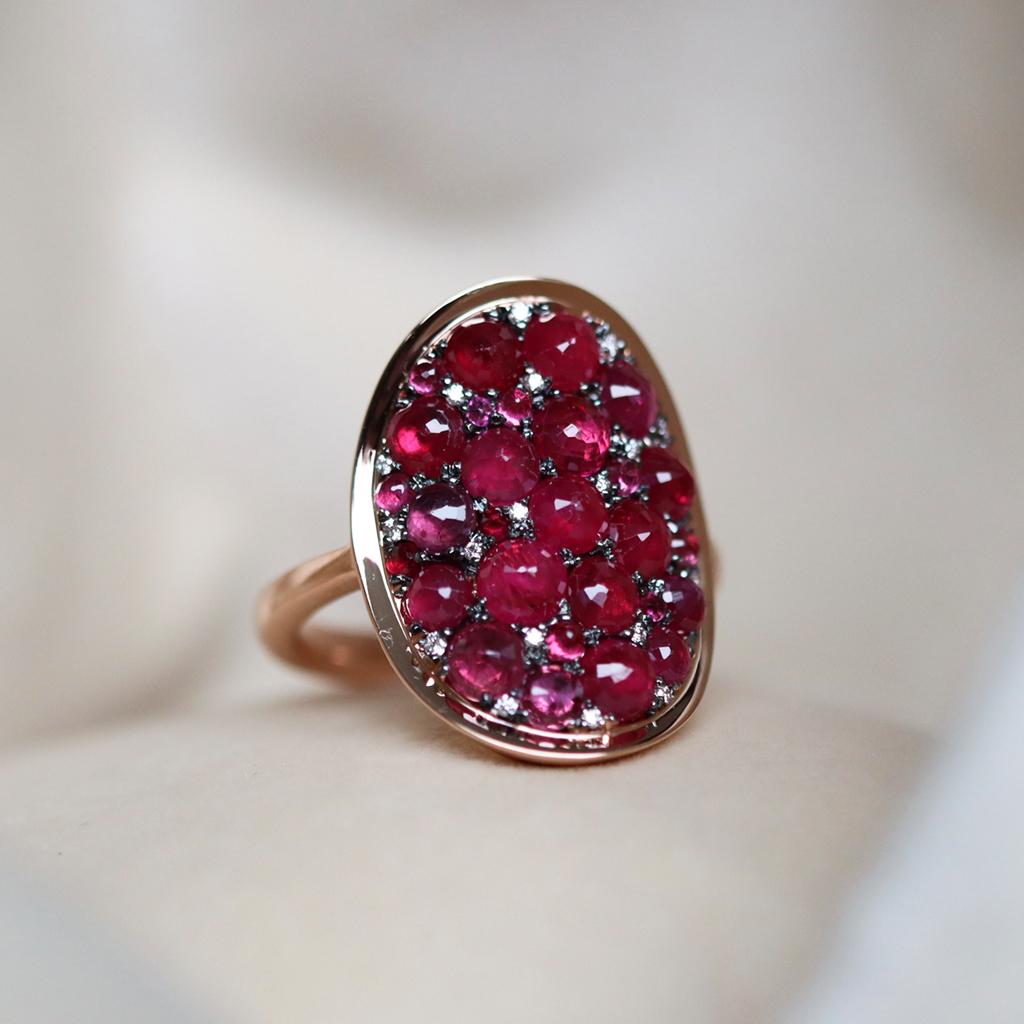 One of a kind ring handmade in Belgium by jewellery artist Joke Quick, no casting or printing envolved, in 18K Rose gold 10.3 gram.
Pave set with :
Burmese Rubies Old Type Cut 5.22 ct.;  
DEGVVS brilliant-cut diamonds 0,06 ct,  

Size EU 54 US 7.