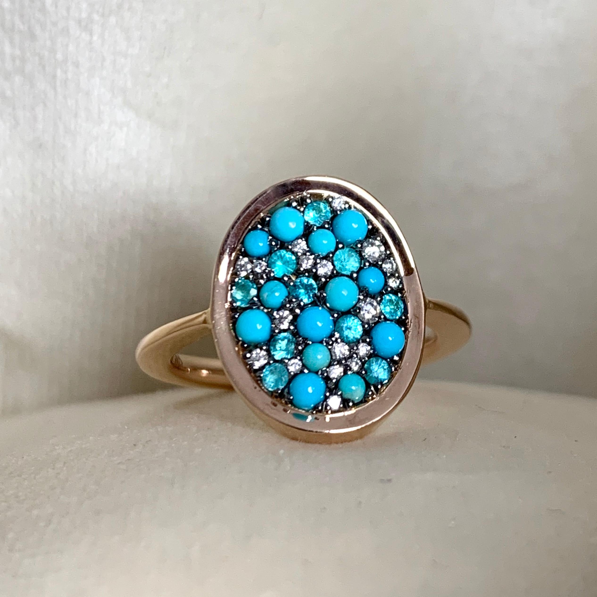 One of a kind ring in 18K Rose gold 4,5 g & blackened sterling silver (The stones are set on silver to create a black background for the stones) Pave set with Turquoise cabochons 0,42ct., Paraïba Tourmalines 0,15 ct., white DEGVVS brilliant-cut