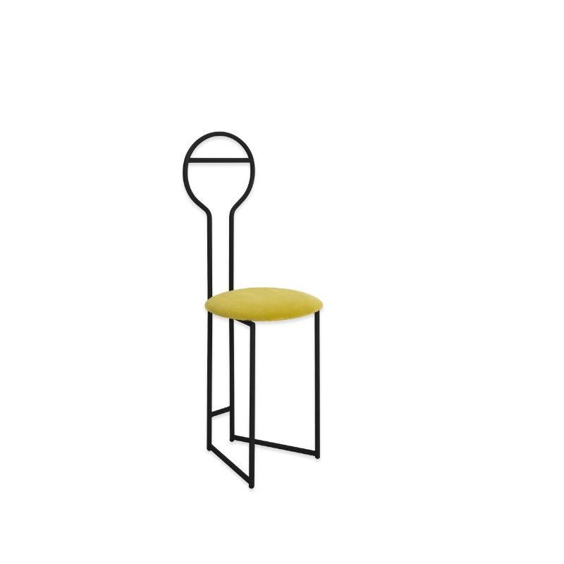 Joly Chairdrobe black HB Velvetforthy Chartreuse by Colé Italia with Lorenz&Kaz (2019)
Dimensions: H.105/seat H. 45 D.38 W.40 cm.
Materials: tubular steel, bent and powder painted. Padded upholstered seat
Finishing: GD gold; BK black.

Also