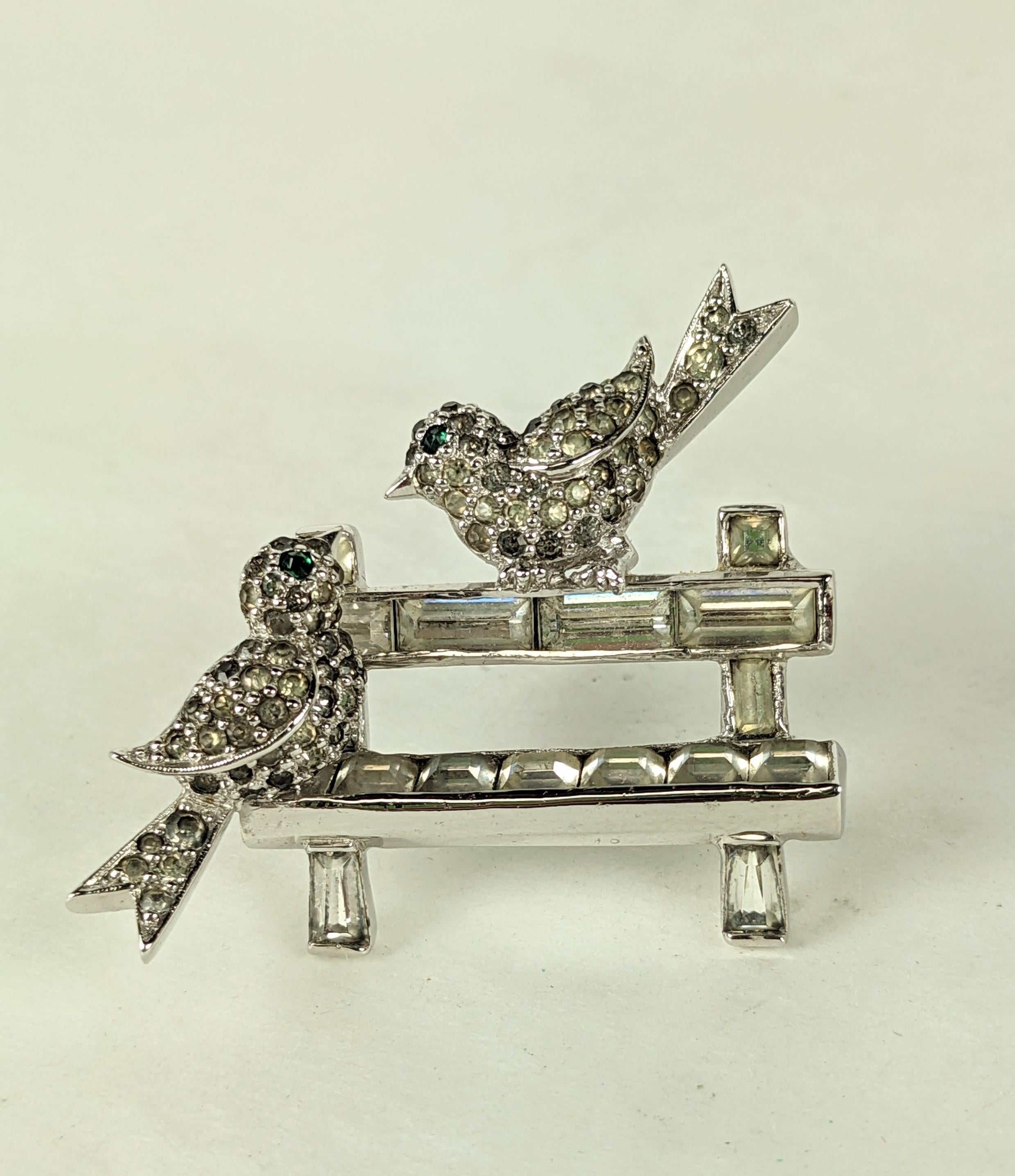 Jomaz Lovebirds on Bench brooch from the 1950's set in rhodium. Charming pave birds are perched on bench set with channel set crystals. 1.3