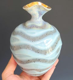 Petit vase sculptural en céramique verte