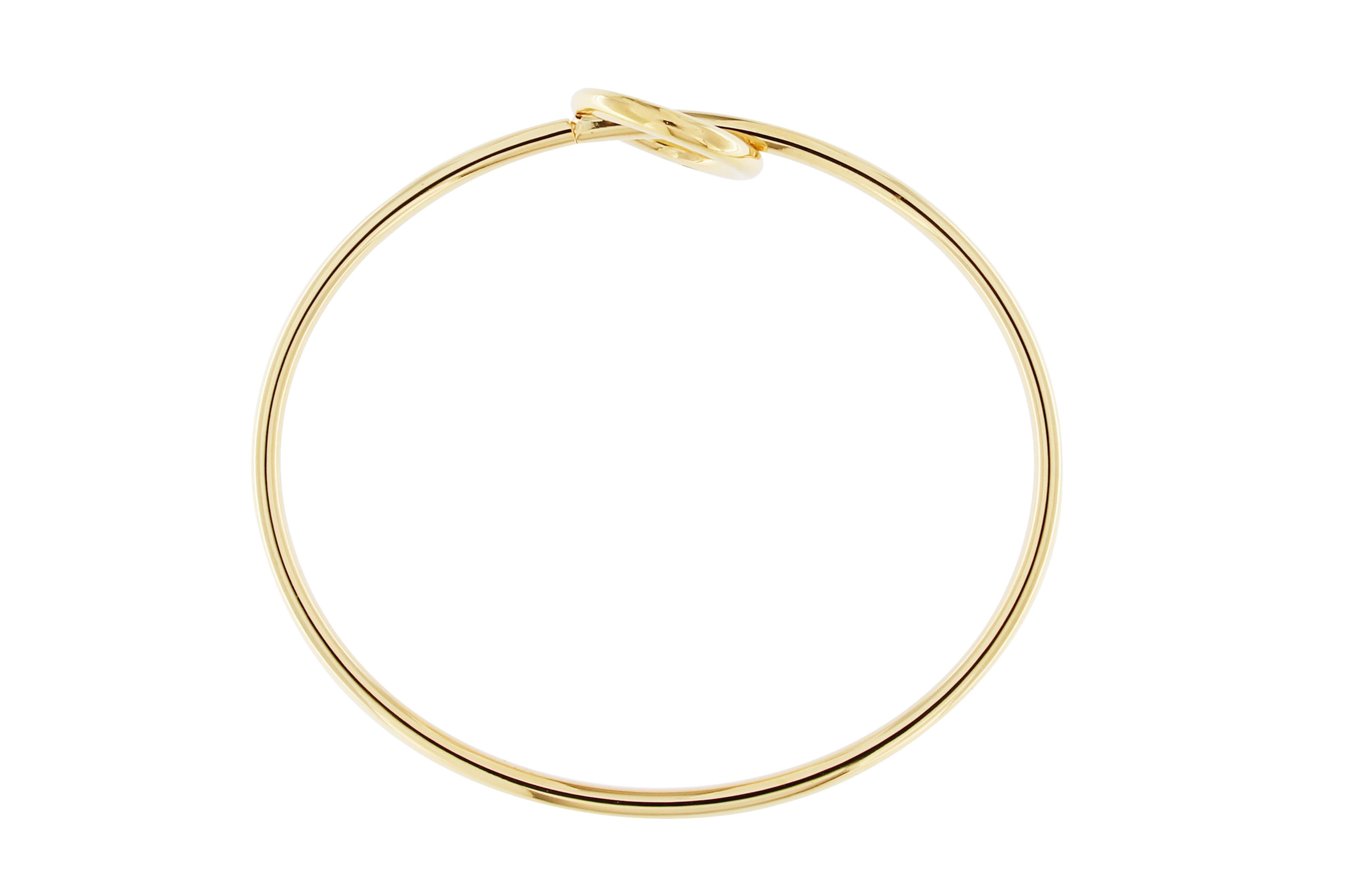 Alex Jona design collection, hand crafted in Italy, 18 karat yellow gold bracelet featuring a central crossing circle element.
Dimensions:
2.14 in. H x 2.43 in. W x 0.62 in. D
55 mm. H x 62 mm. W x 16 mm. D
Alex Jona jewels stand out, not only for
