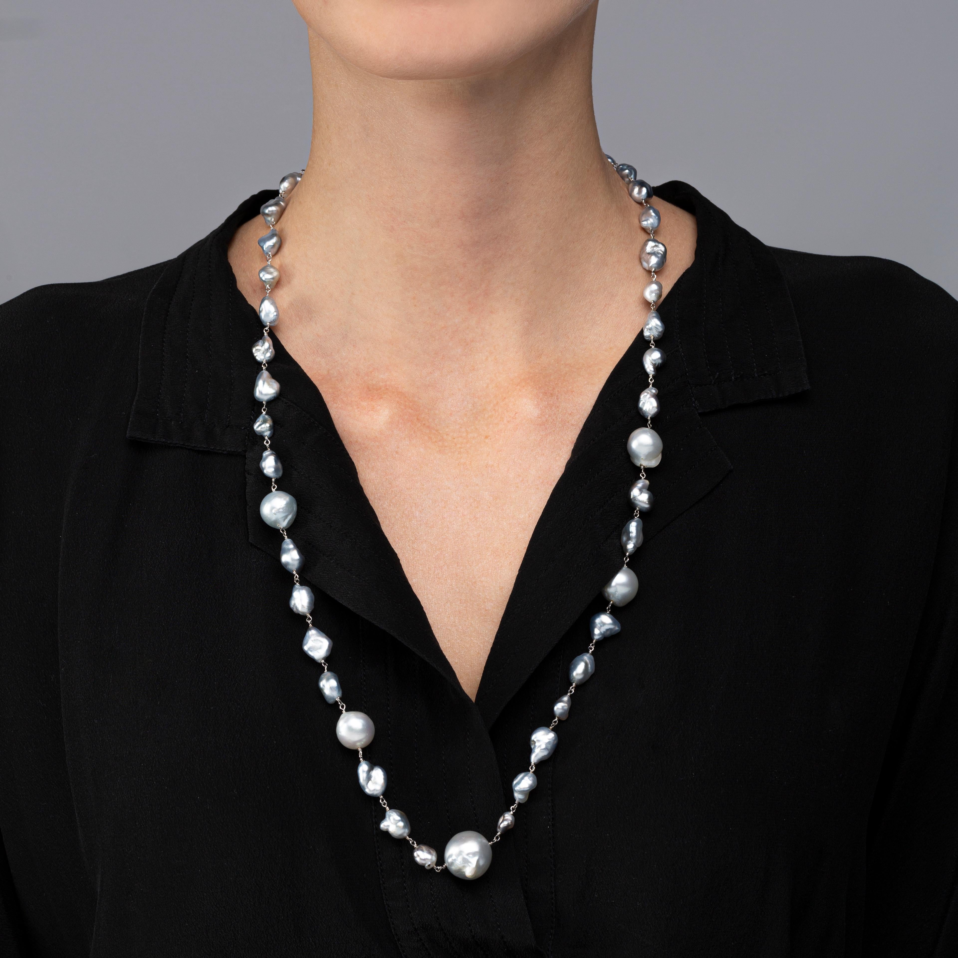 Alex Jona design collection, hand crafted in Italy, 18 karat white gold necklace featuring 45 light grey baroque South Sea pearls weighing 43.01 carats.
Dimensions: 28.34 in. L x 0.69 in. W - 72 cm. L x 1.7 cm. W

Alex Jona jewels stand out, not