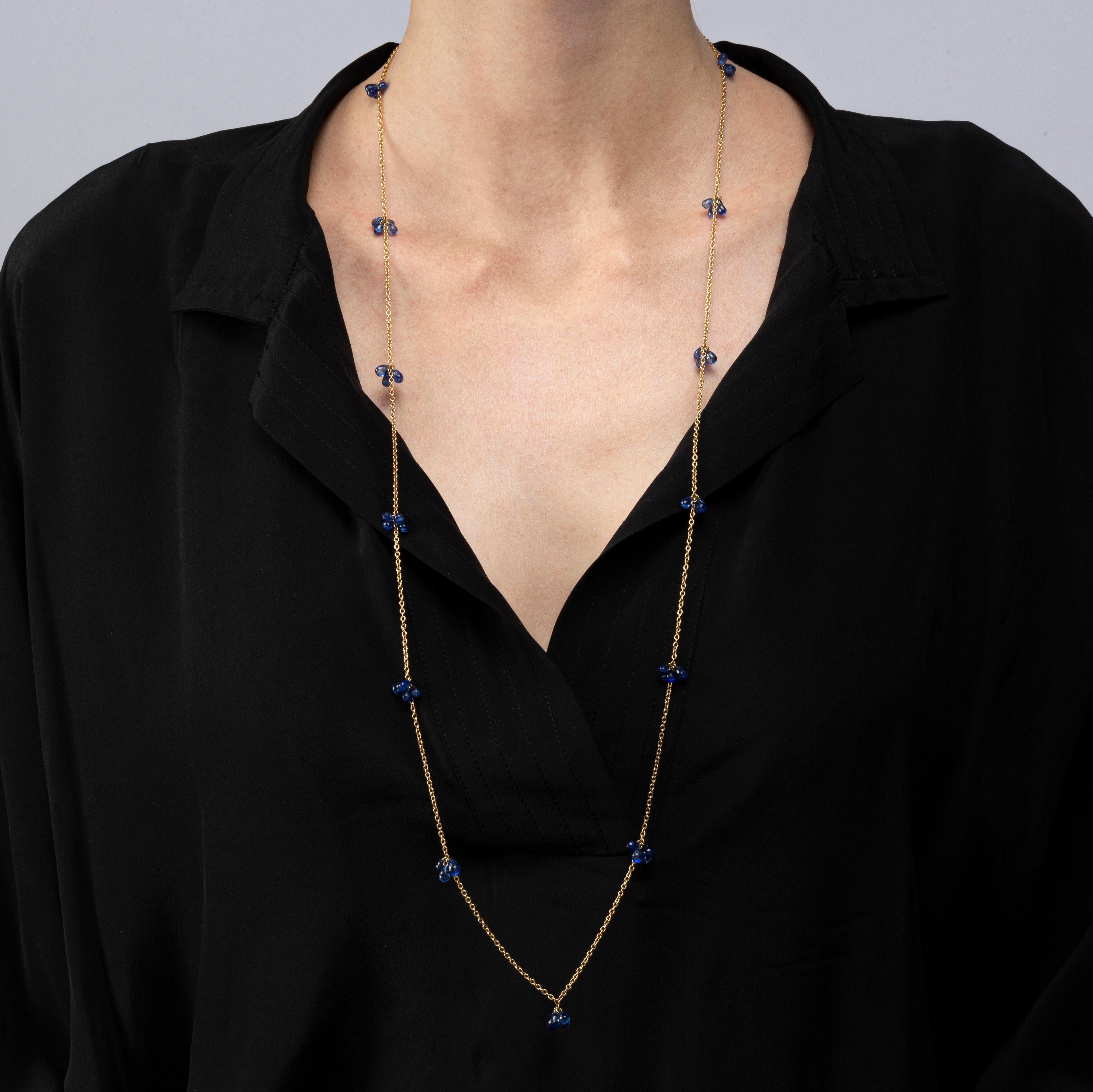 Alex Jona design collection, hand crafted in Italy, 18 karat yellow gold sautoir long chain necklace, 35.43in.- 90 cm. long, with 40.10 carats of blue sapphire briolette drops.

Alex Jona jewels stand out, not only for their special design and for