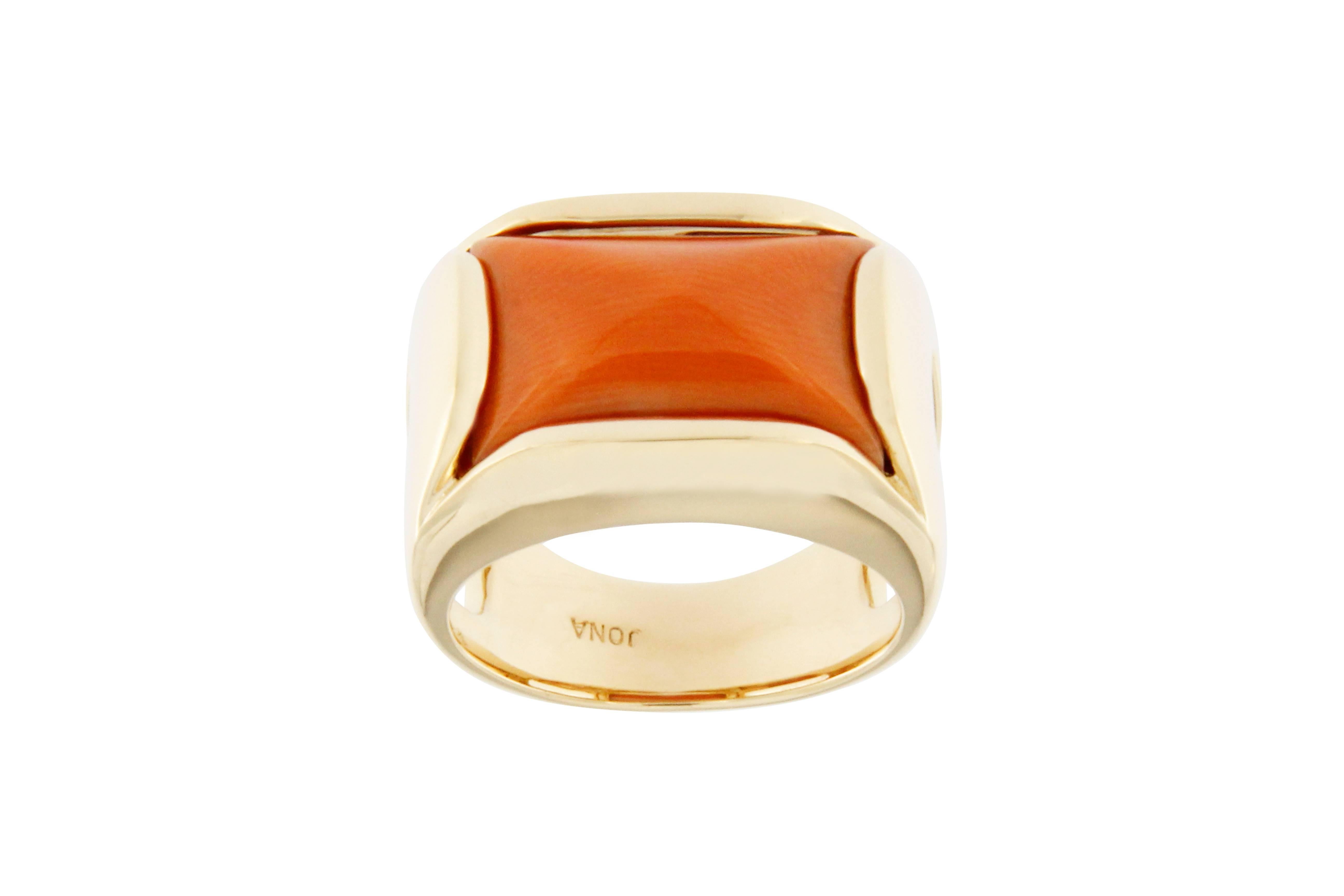 Jona design collection, hand crafted in Italy, 18 carat yellow gold band ring centering a Mediterranean Coral weighing 7.25ct. Dimensions: 0.94 in. H/ 0.80 in. - W/ 0.51 in. -  D/23,87 mm H/ 20 mm W / 12,95 mm D
All Jona jewelry is new and has never