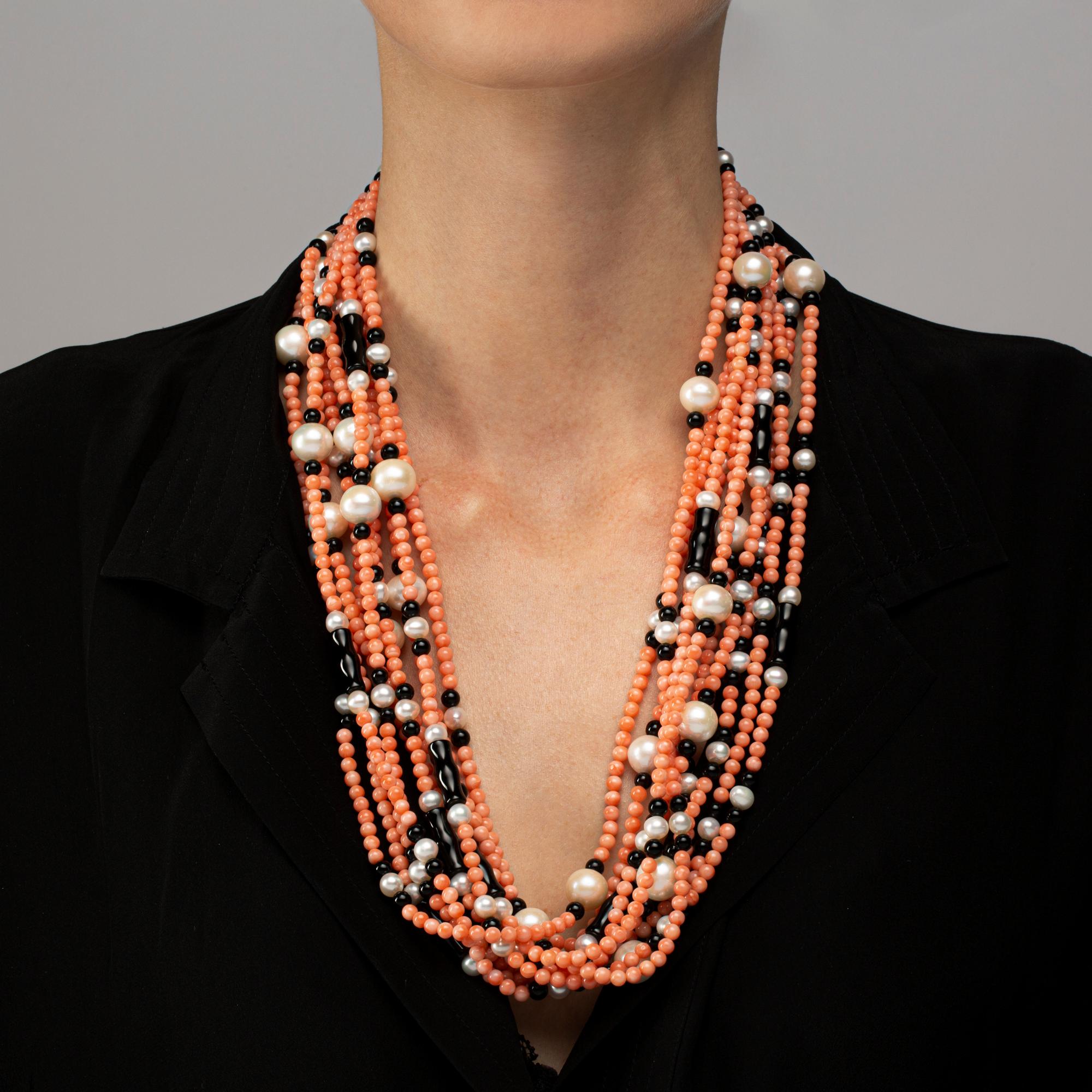 Alex Jona design collection, hand crafted in Italy, 10 row mediterranean coral, onyx, fresh and sea water pearl necklace, with a 18 Karat yellow gold clasp.
Dimensions: L x 68 cm, L x 26.77 in.

Alex Jona jewels stand out, not only for their special