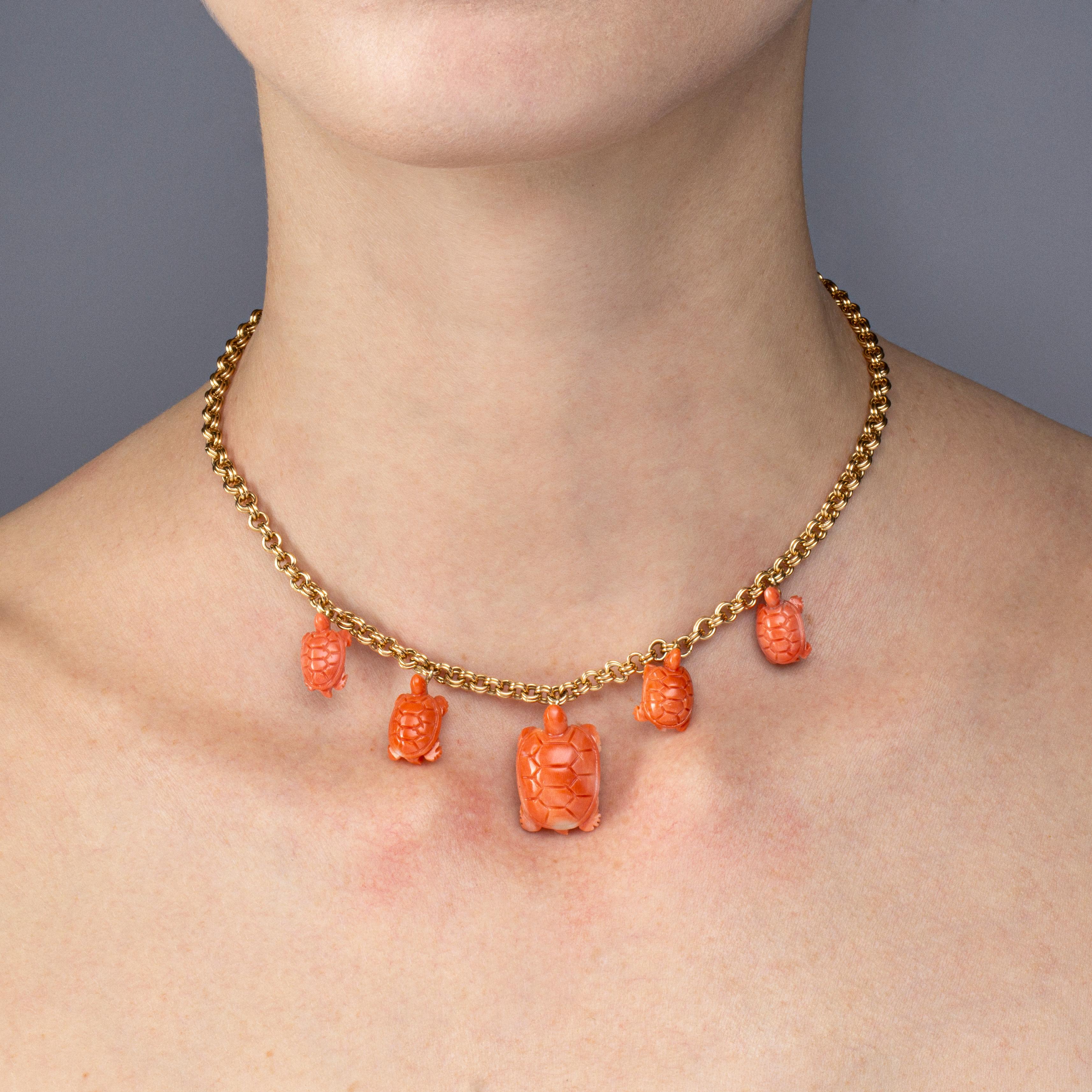 Alex Jona design collection, hand crafted in Italy, 18 karat yellow gold chain necklace with 7 turtle-shaped red coral charms.

Alex Jona jewels stand out, not only for their special design and for the excellent quality of the gemstones, but also